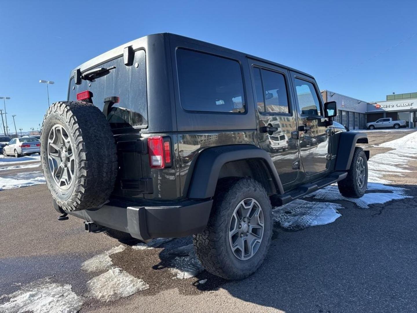 2015 Tank Clearcoat /Black Jeep Wrangler Unlimited Rubicon (1C4BJWFG7FL) with an 3.6L V6 24V VVT engine, Manual transmission, located at 10890 W. Colfax Ave., Lakewood, CO, 80215, (303) 274-7692, 39.739914, -105.120132 - 2015 Jeep Wrangler 4WD All Cars Have Clean Titles And Are Serviced Before Sale., Clean Carfax, No Accident, Non Smoker, 3.6L V6 24V VVT, 6-Speed Manual, 4WD, Body Color 3-Piece Hard Top.<br><br>D1 Auto NEVER charges dealer fees! All cars have clean titles and have been inspected for mechanical issue - Photo#4