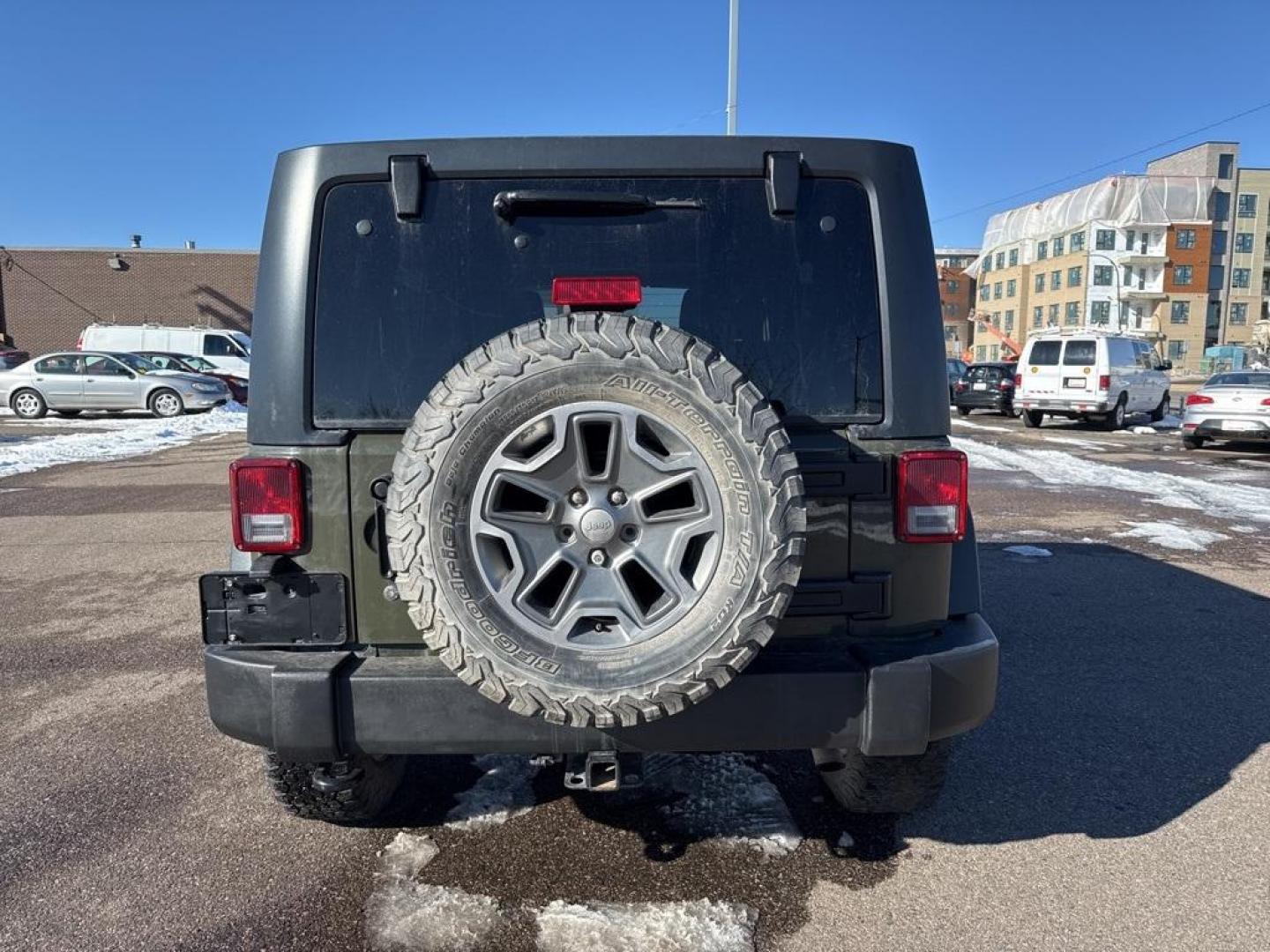 2015 Tank Clearcoat /Black Jeep Wrangler Unlimited Rubicon (1C4BJWFG7FL) with an 3.6L V6 24V VVT engine, Manual transmission, located at 10890 W. Colfax Ave., Lakewood, CO, 80215, (303) 274-7692, 39.739914, -105.120132 - 2015 Jeep Wrangler 4WD All Cars Have Clean Titles And Are Serviced Before Sale., Clean Carfax, No Accident, Non Smoker, 3.6L V6 24V VVT, 6-Speed Manual, 4WD, Body Color 3-Piece Hard Top.<br><br>D1 Auto NEVER charges dealer fees! All cars have clean titles and have been inspected for mechanical issue - Photo#5