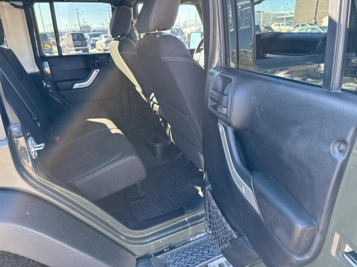 2015 Tank Clearcoat /Black Jeep Wrangler Unlimited Rubicon (1C4BJWFG7FL) with an 3.6L V6 24V VVT engine, Manual transmission, located at 10890 W. Colfax Ave., Lakewood, CO, 80215, (303) 274-7692, 39.739914, -105.120132 - 2015 Jeep Wrangler 4WD All Cars Have Clean Titles And Are Serviced Before Sale., Clean Carfax, No Accident, Non Smoker, 3.6L V6 24V VVT, 6-Speed Manual, 4WD, Body Color 3-Piece Hard Top.<br><br>D1 Auto NEVER charges dealer fees! All cars have clean titles and have been inspected for mechanical issue - Photo#10