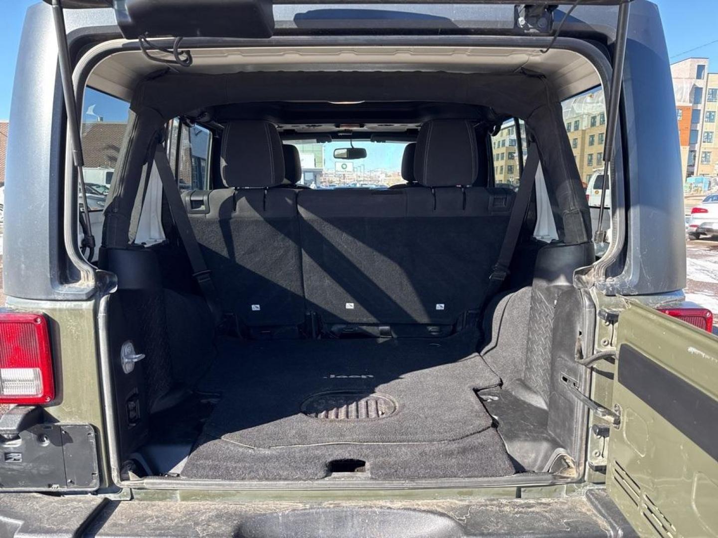2015 Tank Clearcoat /Black Jeep Wrangler Unlimited Rubicon (1C4BJWFG7FL) with an 3.6L V6 24V VVT engine, Manual transmission, located at 10890 W. Colfax Ave., Lakewood, CO, 80215, (303) 274-7692, 39.739914, -105.120132 - 2015 Jeep Wrangler 4WD All Cars Have Clean Titles And Are Serviced Before Sale., Clean Carfax, No Accident, Non Smoker, 3.6L V6 24V VVT, 6-Speed Manual, 4WD, Body Color 3-Piece Hard Top.<br><br>D1 Auto NEVER charges dealer fees! All cars have clean titles and have been inspected for mechanical issue - Photo#11