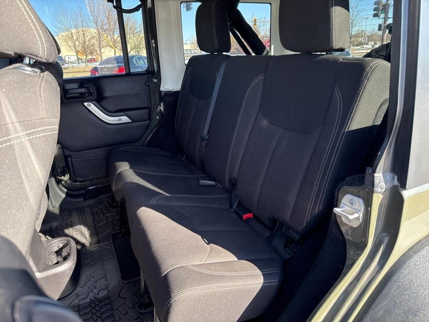 2015 Tank Clearcoat /Black Jeep Wrangler Unlimited Rubicon (1C4BJWFG7FL) with an 3.6L V6 24V VVT engine, Manual transmission, located at 10890 W. Colfax Ave., Lakewood, CO, 80215, (303) 274-7692, 39.739914, -105.120132 - 2015 Jeep Wrangler 4WD All Cars Have Clean Titles And Are Serviced Before Sale., Clean Carfax, No Accident, Non Smoker, 3.6L V6 24V VVT, 6-Speed Manual, 4WD, Body Color 3-Piece Hard Top.<br><br>D1 Auto NEVER charges dealer fees! All cars have clean titles and have been inspected for mechanical issue - Photo#12