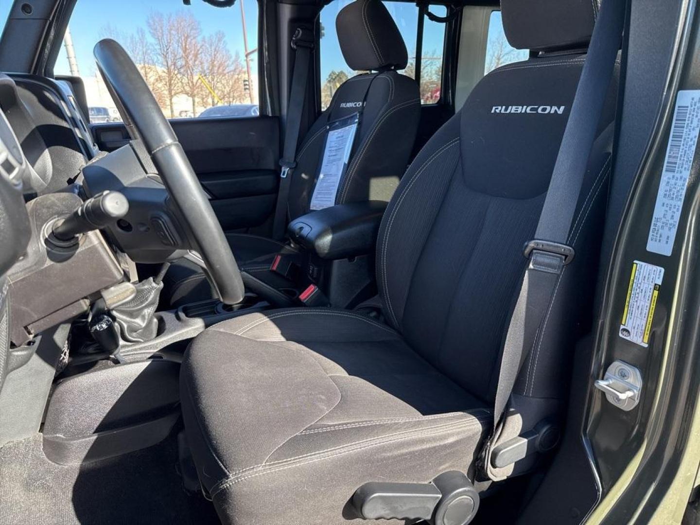 2015 Tank Clearcoat /Black Jeep Wrangler Unlimited Rubicon (1C4BJWFG7FL) with an 3.6L V6 24V VVT engine, Manual transmission, located at 10890 W. Colfax Ave., Lakewood, CO, 80215, (303) 274-7692, 39.739914, -105.120132 - 2015 Jeep Wrangler 4WD All Cars Have Clean Titles And Are Serviced Before Sale., Clean Carfax, No Accident, Non Smoker, 3.6L V6 24V VVT, 6-Speed Manual, 4WD, Body Color 3-Piece Hard Top.<br><br>D1 Auto NEVER charges dealer fees! All cars have clean titles and have been inspected for mechanical issue - Photo#15