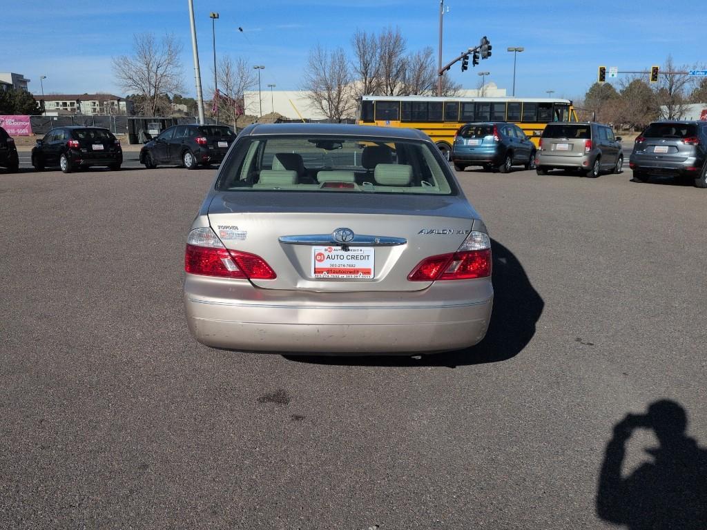 2004 GOLD Toyota Avalon XL (4T1BF28B74U) with an V6, 3.0L engine, Automatic transmission, located at 10890 W. Colfax Ave., Lakewood, CO, 80215, (303) 274-7692, 39.739914, -105.120132 - Photo#5
