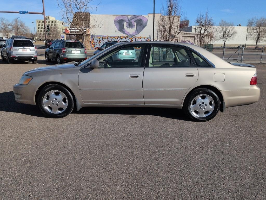 2004 GOLD Toyota Avalon XL (4T1BF28B74U) with an V6, 3.0L engine, Automatic transmission, located at 10890 W. Colfax Ave., Lakewood, CO, 80215, (303) 274-7692, 39.739914, -105.120132 - Photo#7