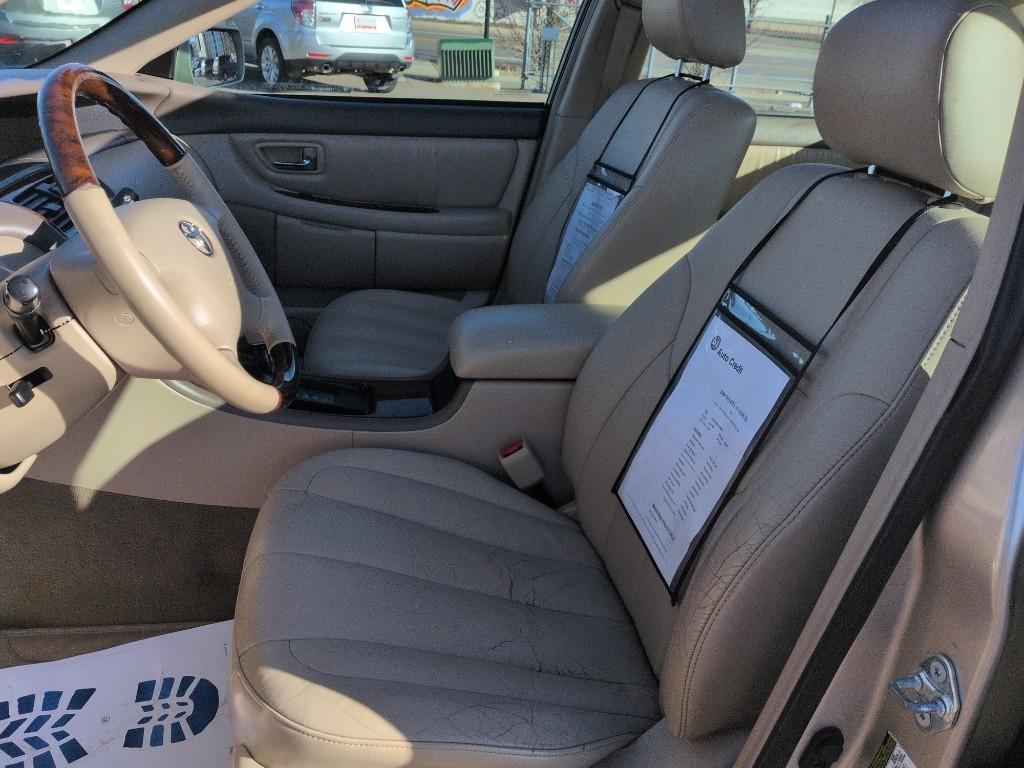 2004 GOLD Toyota Avalon XL (4T1BF28B74U) with an V6, 3.0L engine, Automatic transmission, located at 10890 W. Colfax Ave., Lakewood, CO, 80215, (303) 274-7692, 39.739914, -105.120132 - Photo#9