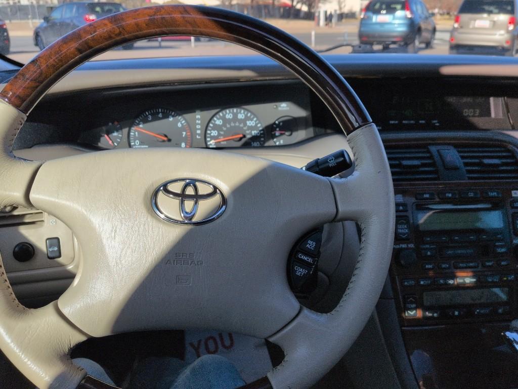 2004 GOLD Toyota Avalon XL (4T1BF28B74U) with an V6, 3.0L engine, Automatic transmission, located at 10890 W. Colfax Ave., Lakewood, CO, 80215, (303) 274-7692, 39.739914, -105.120132 - Photo#10