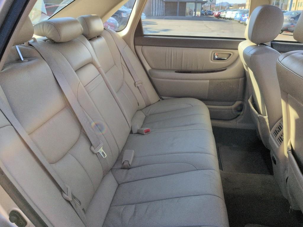 2004 GOLD Toyota Avalon XL (4T1BF28B74U) with an V6, 3.0L engine, Automatic transmission, located at 10890 W. Colfax Ave., Lakewood, CO, 80215, (303) 274-7692, 39.739914, -105.120132 - Photo#20