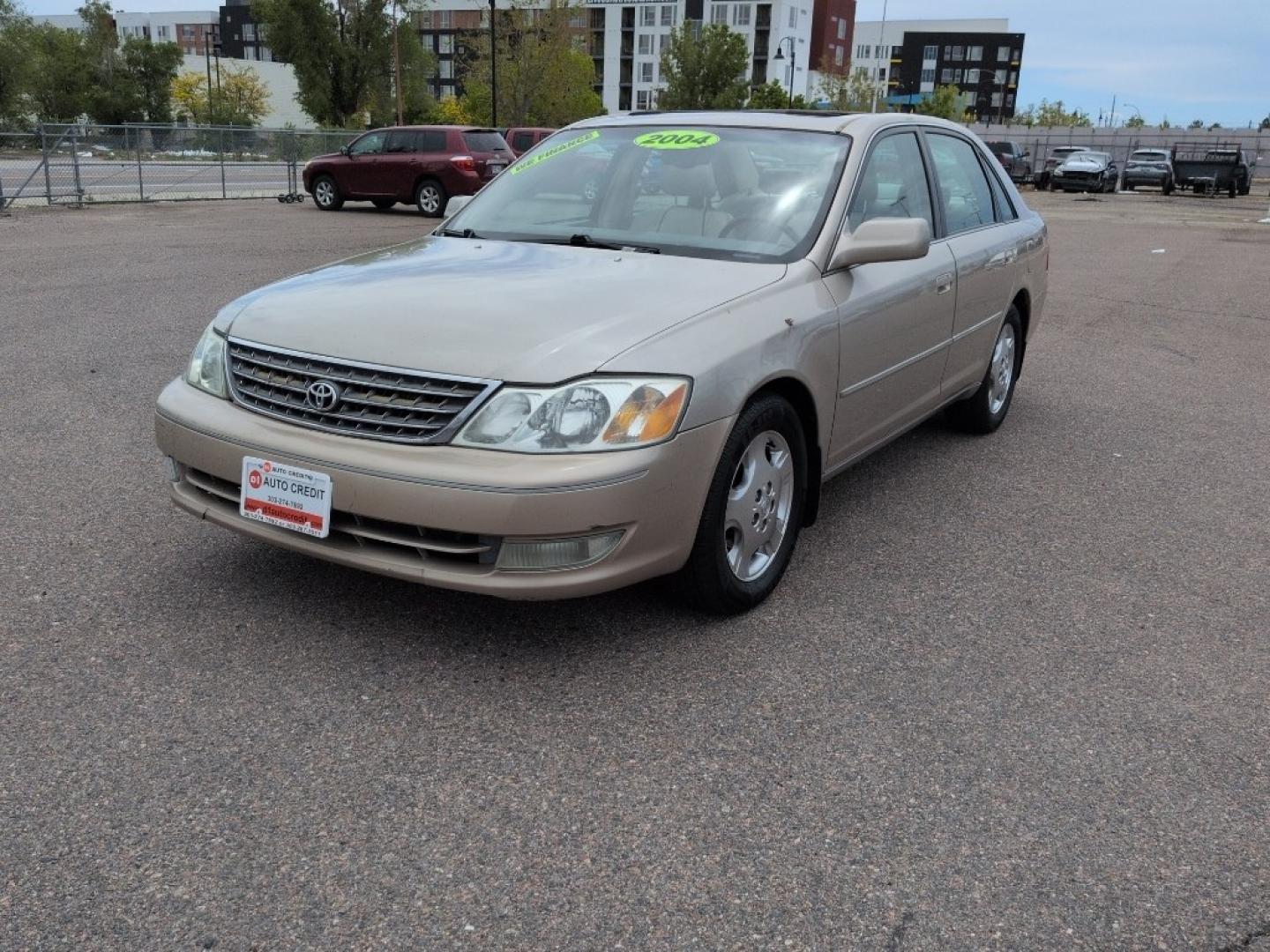 2004 GOLD /EXEMPT Toyota Avalon XL (4T1BF28B74U) with an V6, 3.0L engine, Automatic transmission, located at 10890 W. Colfax Ave., Lakewood, CO, 80215, (303) 274-7692, 39.739914, -105.120132 - Photo#0