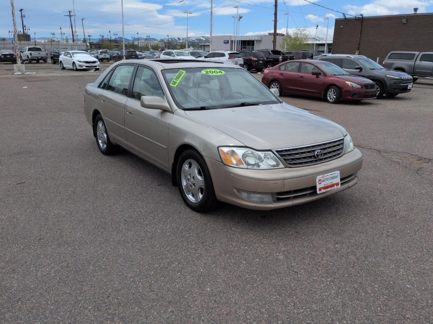 2004 GOLD /EXEMPT Toyota Avalon XL (4T1BF28B74U) with an V6, 3.0L engine, Automatic transmission, located at 10890 W. Colfax Ave., Lakewood, CO, 80215, (303) 274-7692, 39.739914, -105.120132 - Photo#2