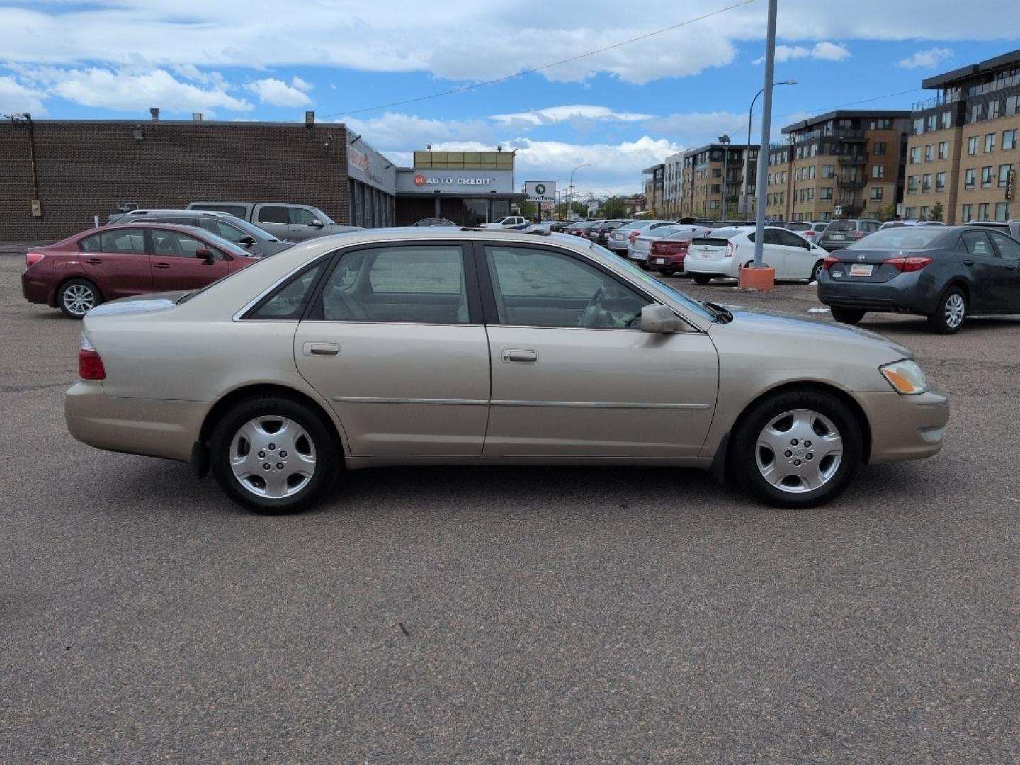 2004 GOLD /EXEMPT Toyota Avalon XL (4T1BF28B74U) with an V6, 3.0L engine, Automatic transmission, located at 10890 W. Colfax Ave., Lakewood, CO, 80215, (303) 274-7692, 39.739914, -105.120132 - Photo#3