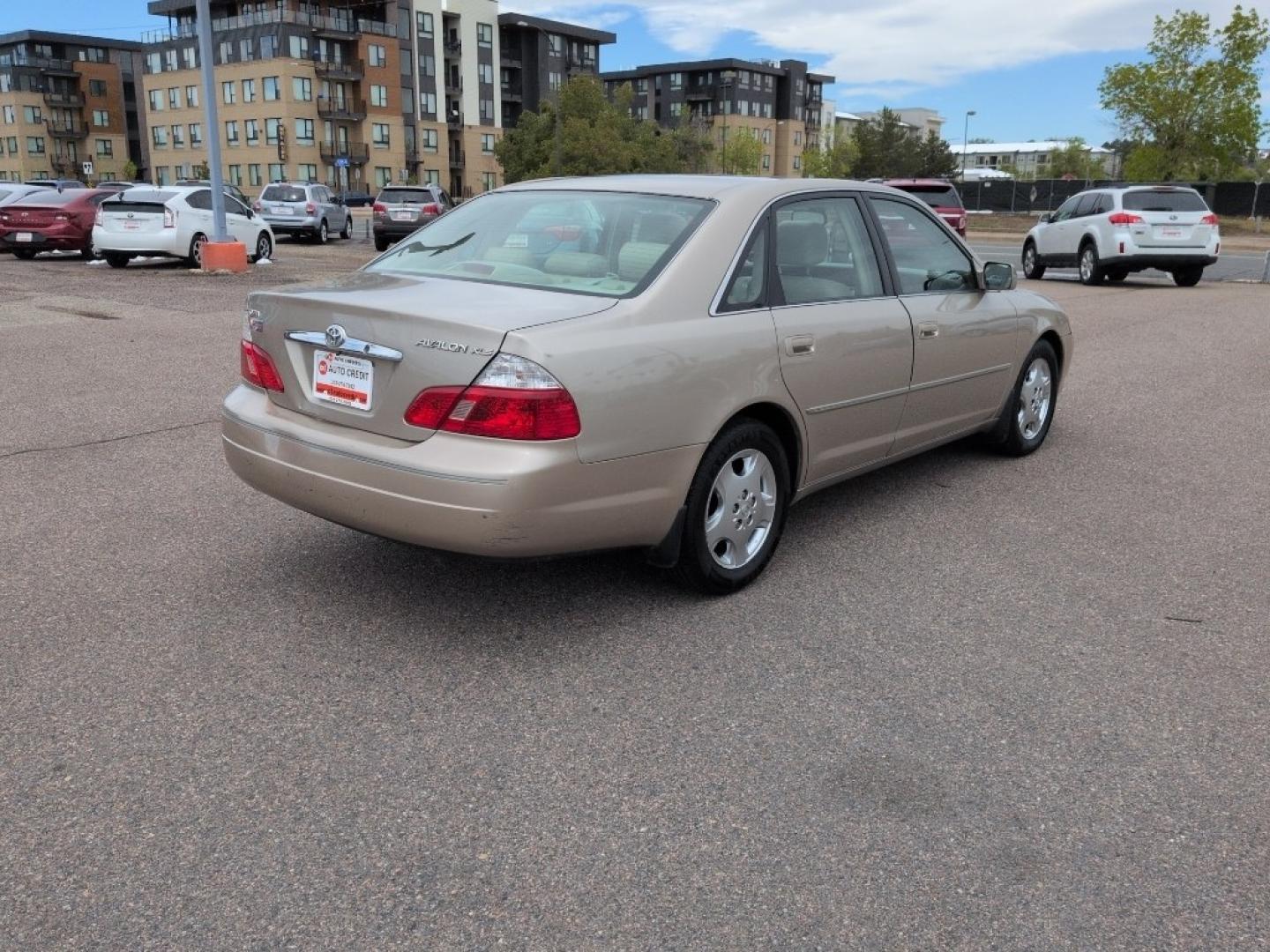 2004 GOLD /EXEMPT Toyota Avalon XL (4T1BF28B74U) with an V6, 3.0L engine, Automatic transmission, located at 10890 W. Colfax Ave., Lakewood, CO, 80215, (303) 274-7692, 39.739914, -105.120132 - Photo#4