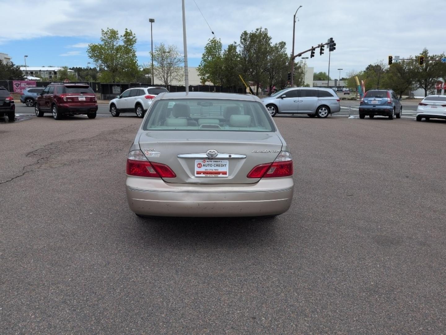 2004 GOLD /EXEMPT Toyota Avalon XL (4T1BF28B74U) with an V6, 3.0L engine, Automatic transmission, located at 10890 W. Colfax Ave., Lakewood, CO, 80215, (303) 274-7692, 39.739914, -105.120132 - Photo#5