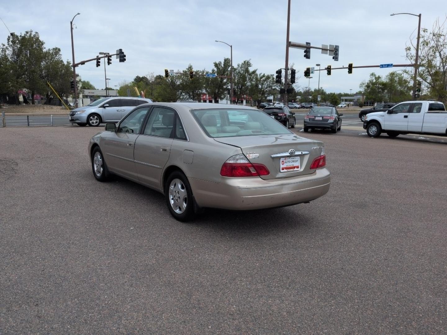 2004 GOLD /EXEMPT Toyota Avalon XL (4T1BF28B74U) with an V6, 3.0L engine, Automatic transmission, located at 10890 W. Colfax Ave., Lakewood, CO, 80215, (303) 274-7692, 39.739914, -105.120132 - Photo#6