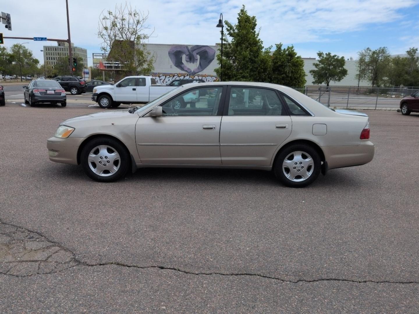 2004 GOLD /EXEMPT Toyota Avalon XL (4T1BF28B74U) with an V6, 3.0L engine, Automatic transmission, located at 10890 W. Colfax Ave., Lakewood, CO, 80215, (303) 274-7692, 39.739914, -105.120132 - Photo#7