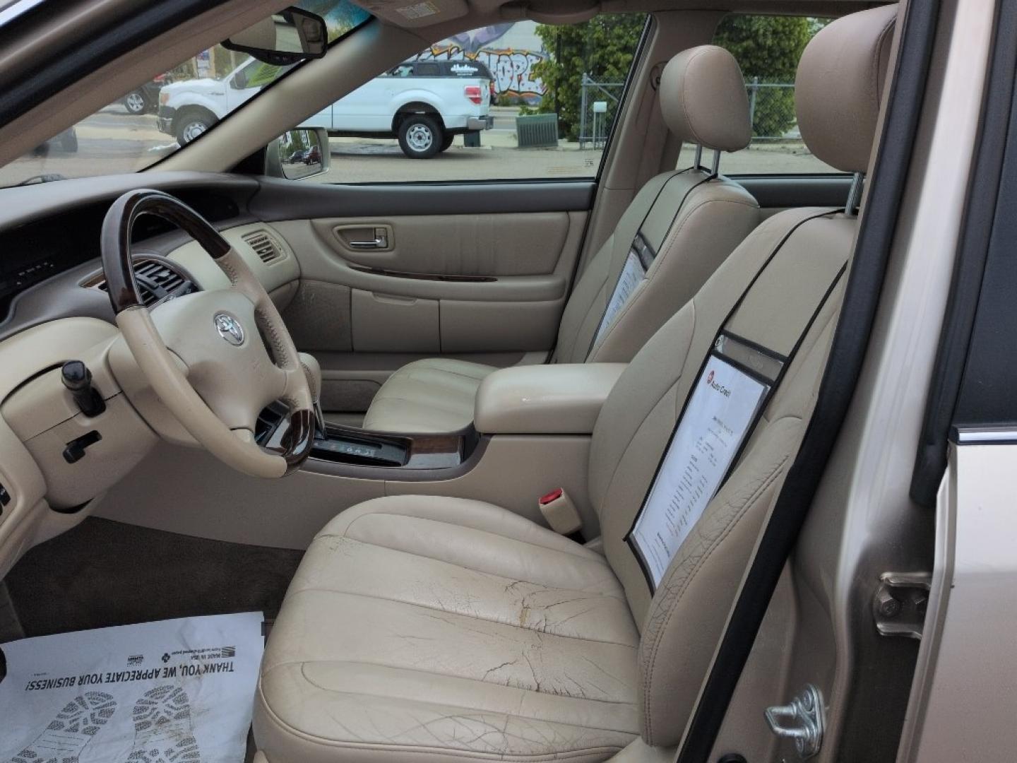 2004 GOLD /EXEMPT Toyota Avalon XL (4T1BF28B74U) with an V6, 3.0L engine, Automatic transmission, located at 10890 W. Colfax Ave., Lakewood, CO, 80215, (303) 274-7692, 39.739914, -105.120132 - Photo#9
