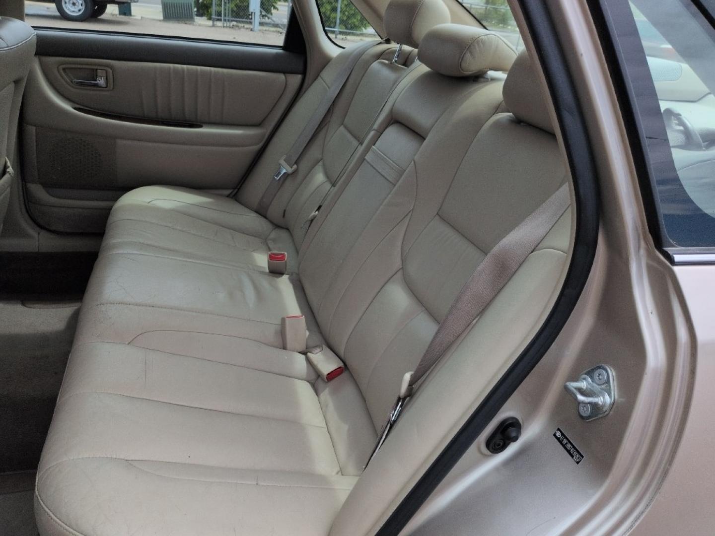 2004 GOLD /EXEMPT Toyota Avalon XL (4T1BF28B74U) with an V6, 3.0L engine, Automatic transmission, located at 10890 W. Colfax Ave., Lakewood, CO, 80215, (303) 274-7692, 39.739914, -105.120132 - Photo#16