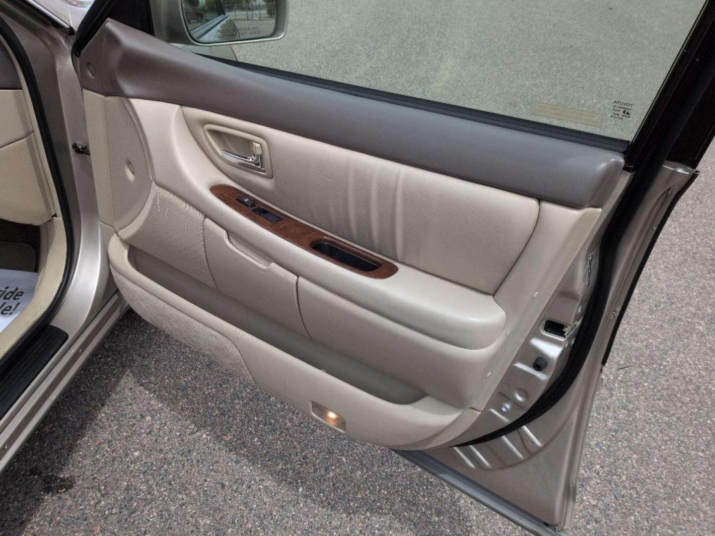 2004 GOLD /EXEMPT Toyota Avalon XL (4T1BF28B74U) with an V6, 3.0L engine, Automatic transmission, located at 10890 W. Colfax Ave., Lakewood, CO, 80215, (303) 274-7692, 39.739914, -105.120132 - Photo#17