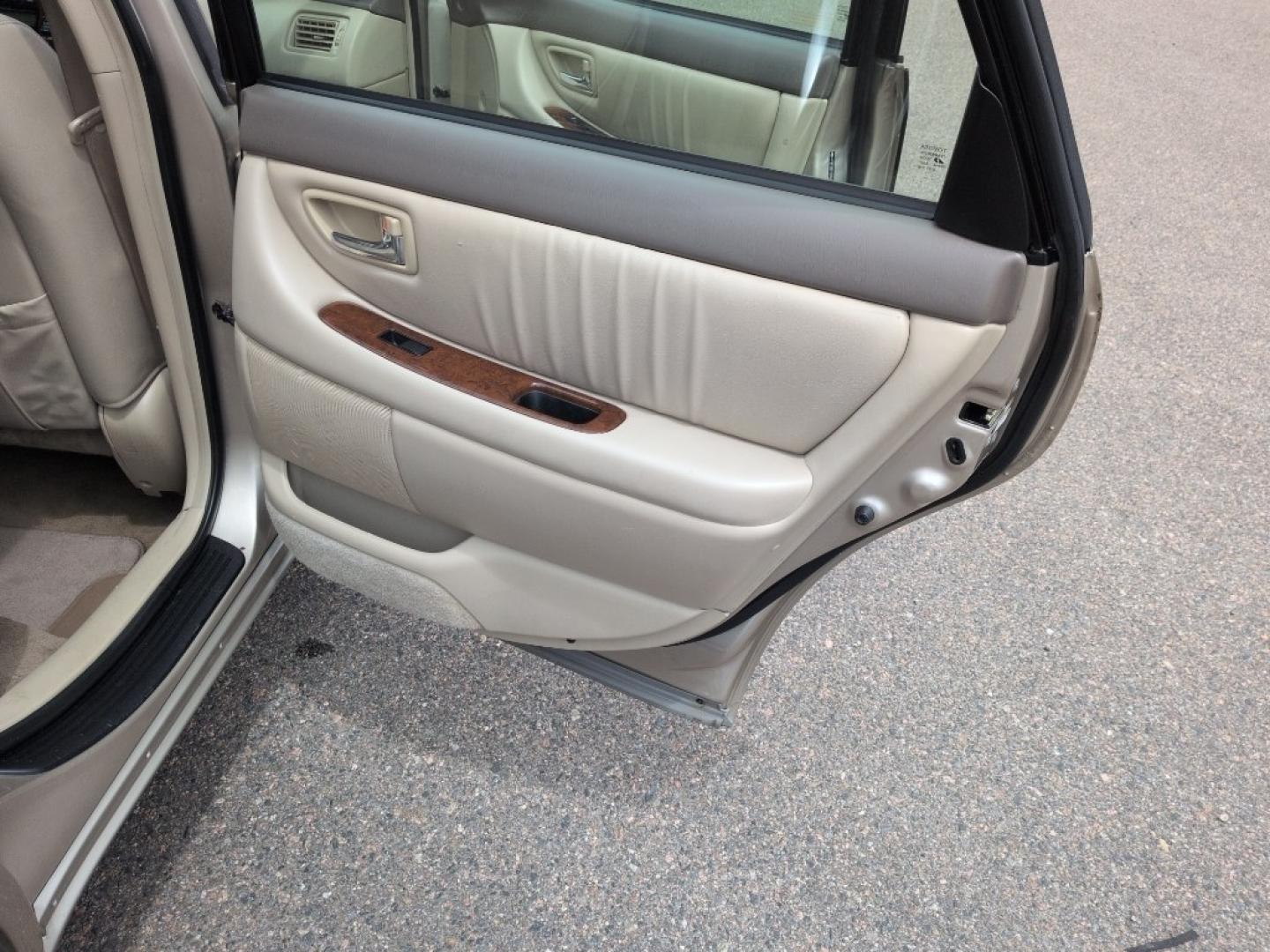 2004 GOLD /EXEMPT Toyota Avalon XL (4T1BF28B74U) with an V6, 3.0L engine, Automatic transmission, located at 10890 W. Colfax Ave., Lakewood, CO, 80215, (303) 274-7692, 39.739914, -105.120132 - Photo#19