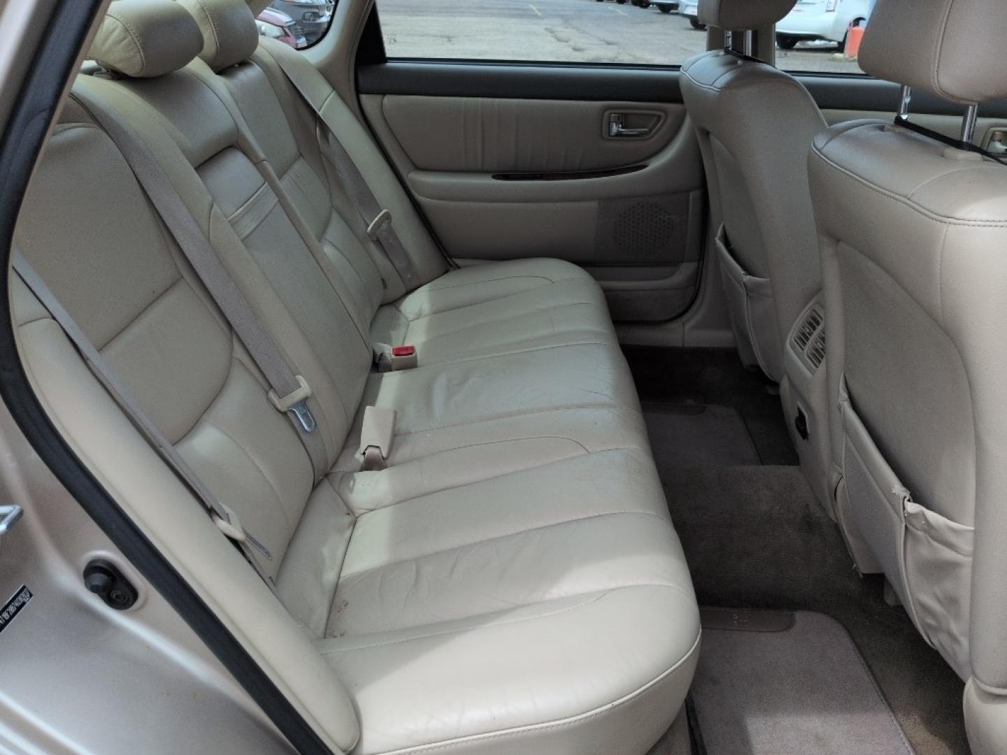 2004 GOLD /EXEMPT Toyota Avalon XL (4T1BF28B74U) with an V6, 3.0L engine, Automatic transmission, located at 10890 W. Colfax Ave., Lakewood, CO, 80215, (303) 274-7692, 39.739914, -105.120132 - Photo#20