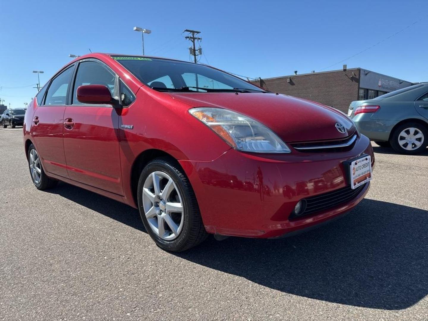 2007 Barcelona Red Metallic /Actual Toyota Prius (JTDKB20U677) with an 1.5L I4 SMPI DOHC engine, CVT transmission, located at 10890 W. Colfax Ave., Lakewood, CO, 80215, (303) 274-7692, 39.739914, -105.120132 - 2007 Toyota Prius FWD 1.5L I4 SMPI DOHC.<br><br>D1 Auto NEVER charges dealer fees! All cars have clean titles and have been inspected for mechanical issues. We have financing for everyone. Good credit, bad credit, first time buyers.<br>Clean CARFAX. Odometer is 51362 miles below market average!<br>P - Photo#2