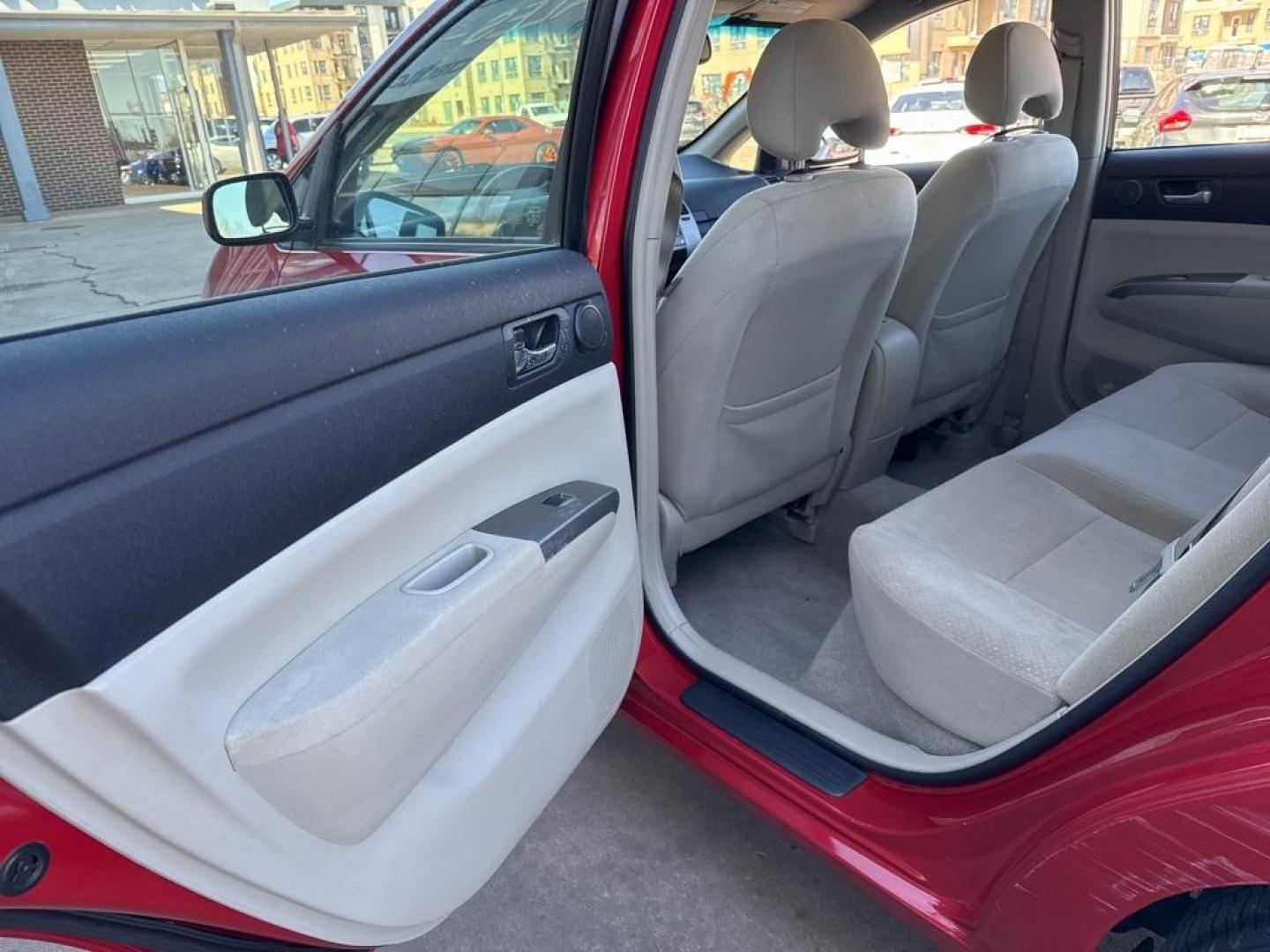2007 Barcelona Red Metallic /Actual Toyota Prius (JTDKB20U677) with an 1.5L I4 SMPI DOHC engine, CVT transmission, located at 10890 W. Colfax Ave., Lakewood, CO, 80215, (303) 274-7692, 39.739914, -105.120132 - 2007 Toyota Prius FWD 1.5L I4 SMPI DOHC.<br><br>D1 Auto NEVER charges dealer fees! All cars have clean titles and have been inspected for mechanical issues. We have financing for everyone. Good credit, bad credit, first time buyers.<br>Clean CARFAX. Odometer is 51362 miles below market average!<br>P - Photo#23
