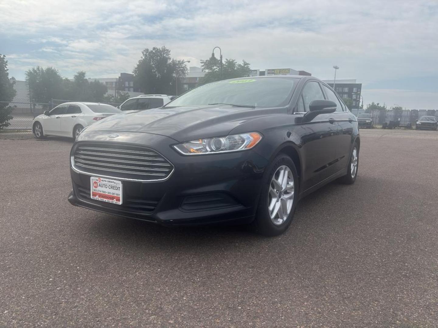 2013 BLACK Ford Fusion SE (3FA6P0HR6DR) with an 4 Cyl, 1.6L engine, Automatic transmission, located at 10890 W. Colfax Ave., Lakewood, CO, 80215, (303) 274-7692, 39.739914, -105.120132 - Photo#0