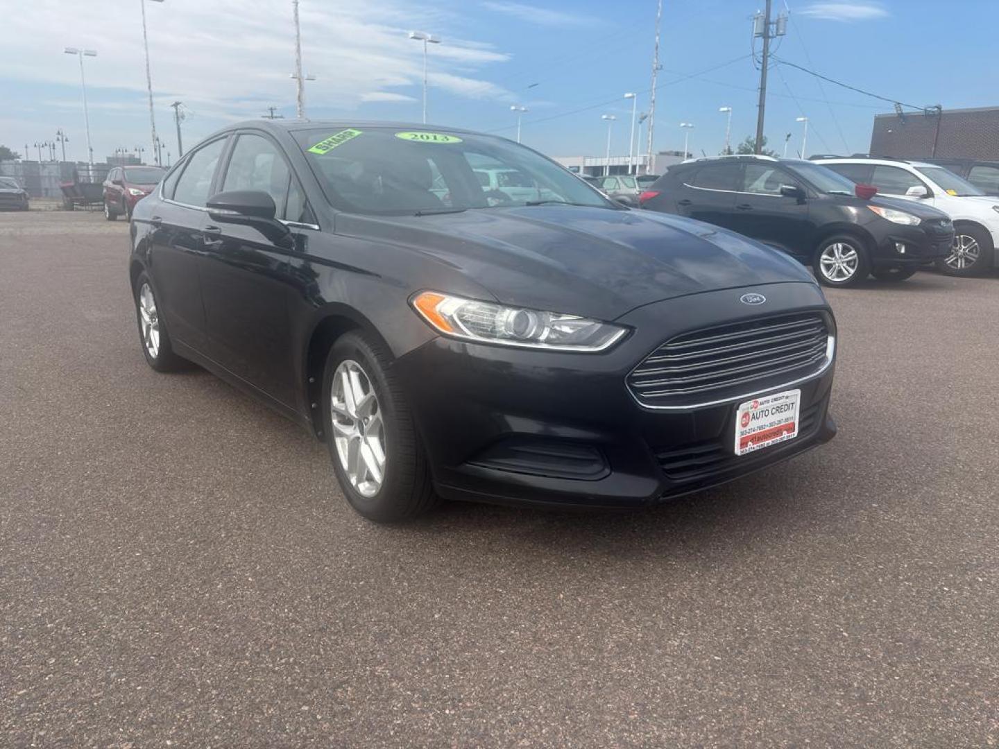 2013 BLACK Ford Fusion SE (3FA6P0HR6DR) with an 4 Cyl, 1.6L engine, Automatic transmission, located at 10890 W. Colfax Ave., Lakewood, CO, 80215, (303) 274-7692, 39.739914, -105.120132 - Photo#1