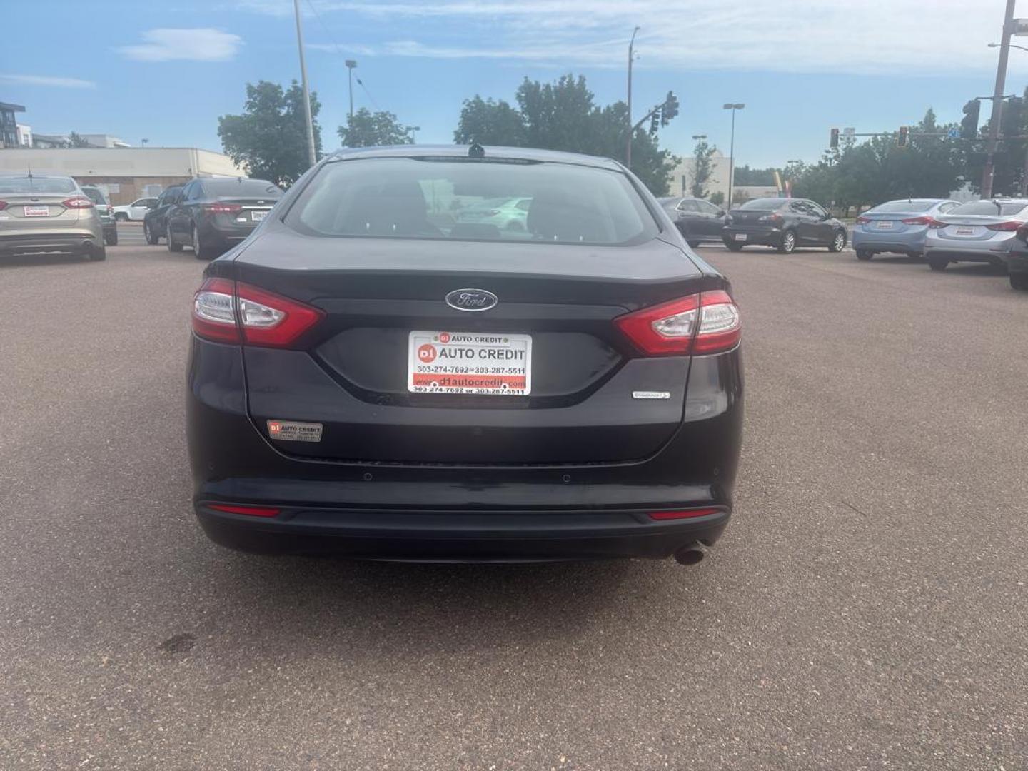 2013 BLACK Ford Fusion SE (3FA6P0HR6DR) with an 4 Cyl, 1.6L engine, Automatic transmission, located at 10890 W. Colfax Ave., Lakewood, CO, 80215, (303) 274-7692, 39.739914, -105.120132 - Photo#4