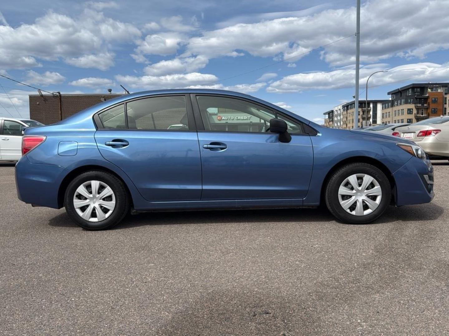 2016 BLUE Subaru Impreza Base (JF1GJAA64GG) with an 4 Cyl, 2.0L engine, Manual transmission, located at 10890 W. Colfax Ave., Lakewood, CO, 80215, (303) 274-7692, 39.739914, -105.120132 - Photo#3