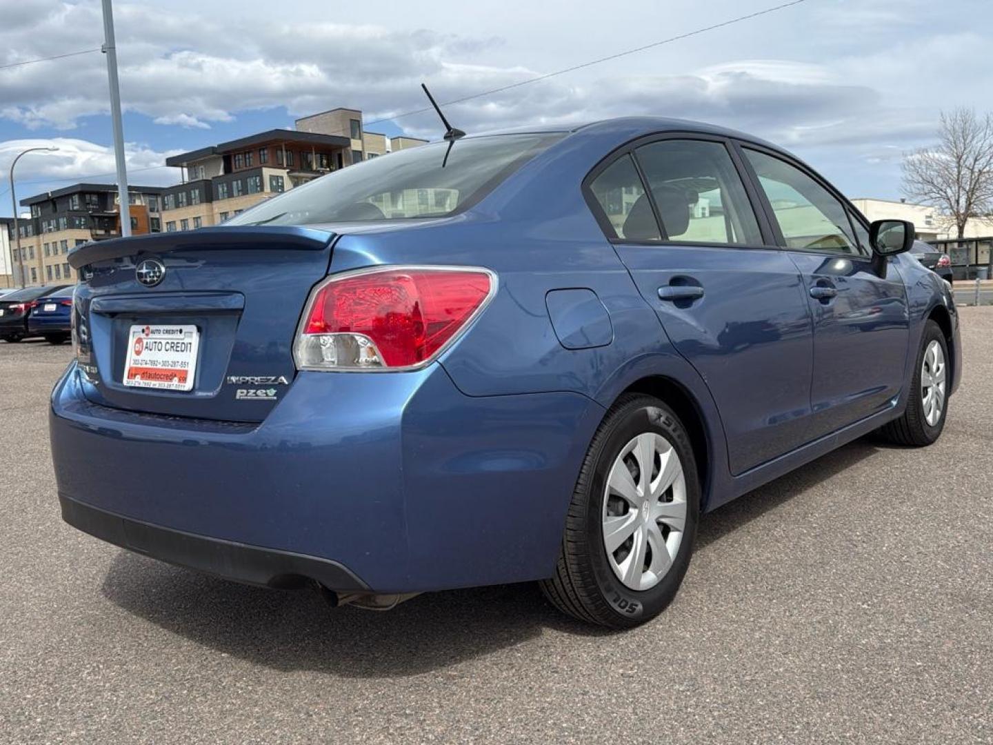 2016 BLUE Subaru Impreza Base (JF1GJAA64GG) with an 4 Cyl, 2.0L engine, Manual transmission, located at 10890 W. Colfax Ave., Lakewood, CO, 80215, (303) 274-7692, 39.739914, -105.120132 - Photo#4