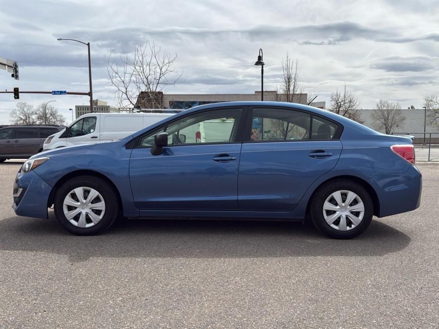 2016 BLUE Subaru Impreza Base (JF1GJAA64GG) with an 4 Cyl, 2.0L engine, Manual transmission, located at 10890 W. Colfax Ave., Lakewood, CO, 80215, (303) 274-7692, 39.739914, -105.120132 - Photo#7