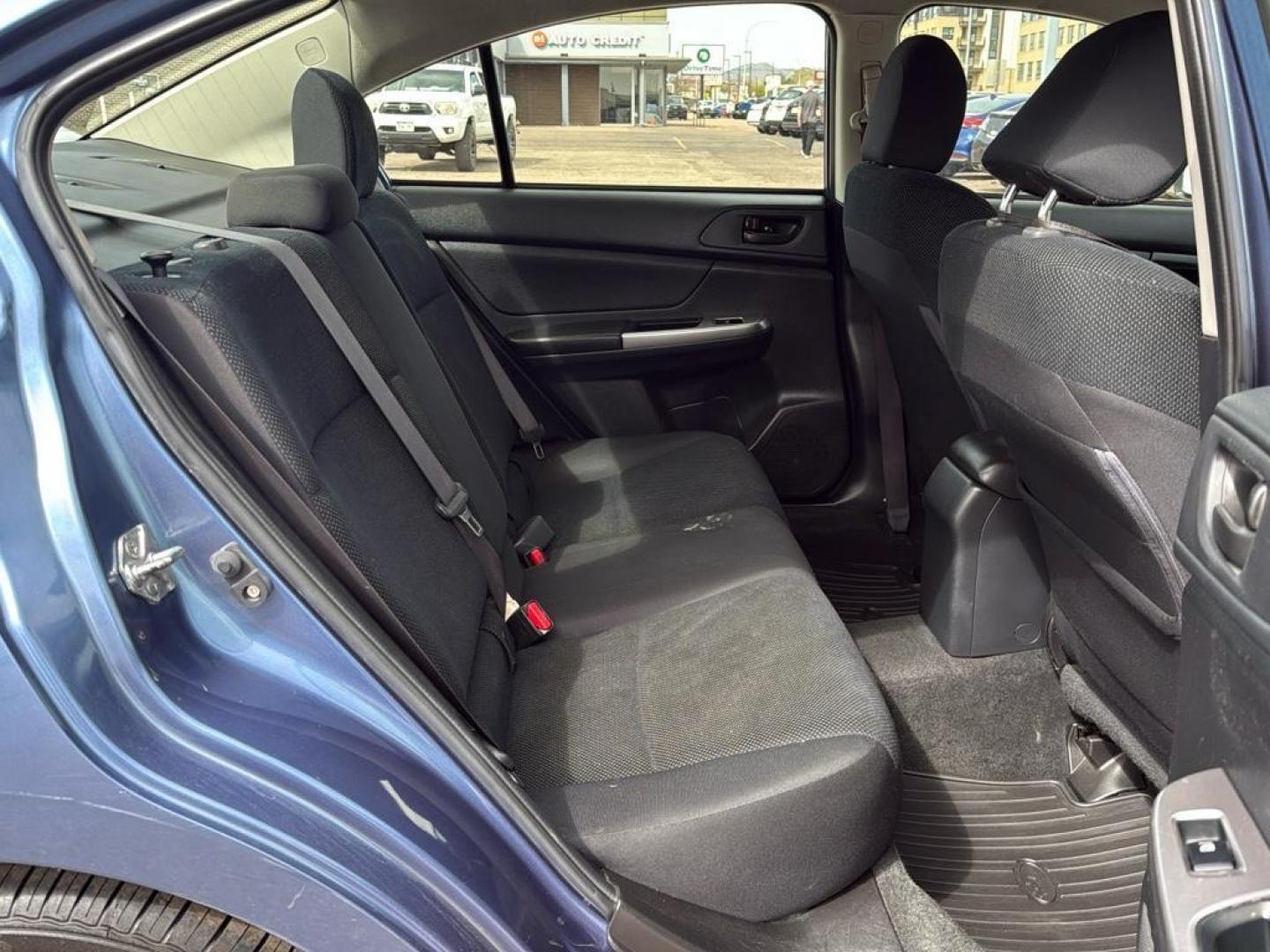2016 BLUE Subaru Impreza Base (JF1GJAA64GG) with an 4 Cyl, 2.0L engine, Manual transmission, located at 10890 W. Colfax Ave., Lakewood, CO, 80215, (303) 274-7692, 39.739914, -105.120132 - Photo#16