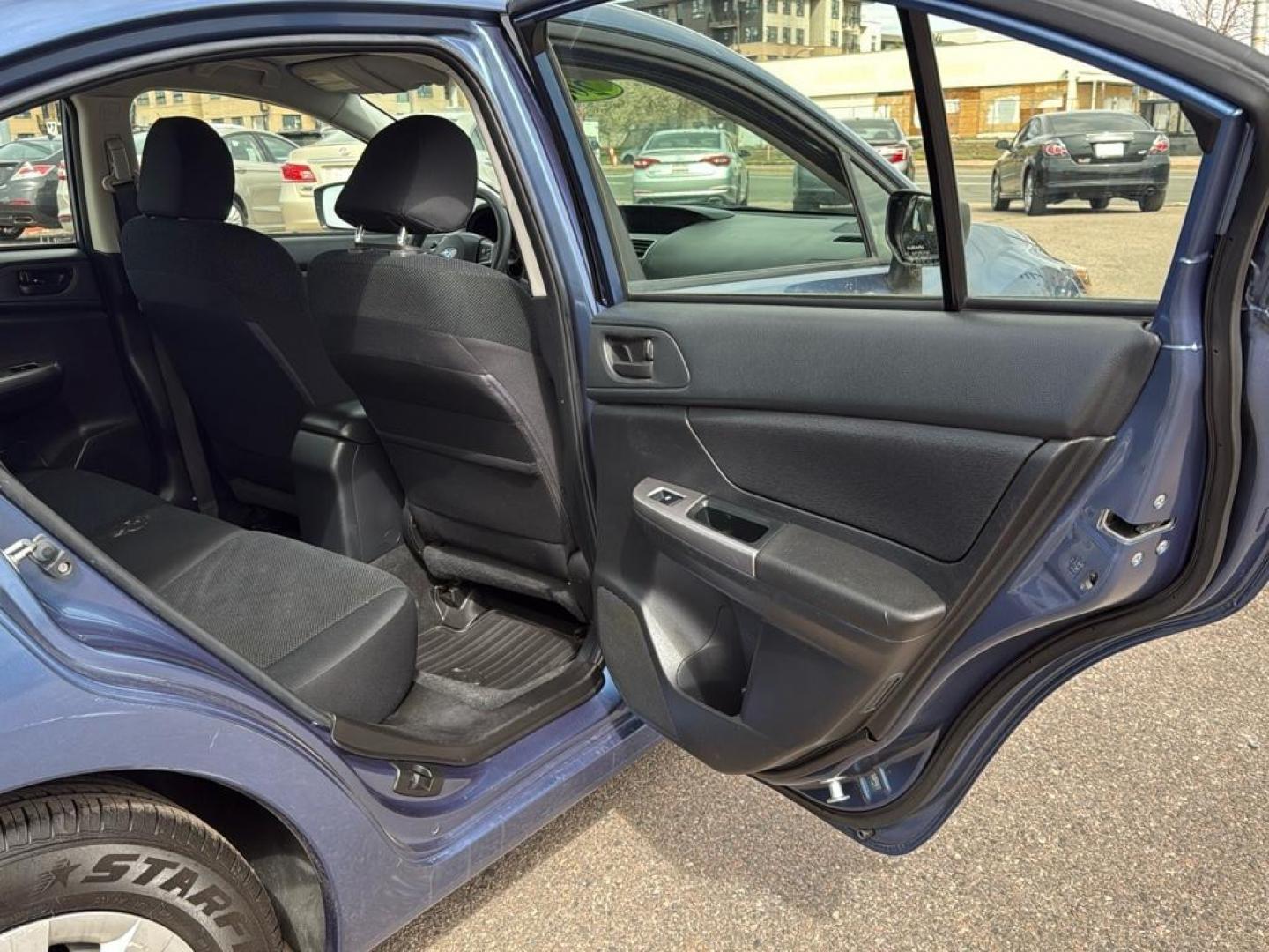 2016 BLUE Subaru Impreza Base (JF1GJAA64GG) with an 4 Cyl, 2.0L engine, Manual transmission, located at 10890 W. Colfax Ave., Lakewood, CO, 80215, (303) 274-7692, 39.739914, -105.120132 - Photo#21