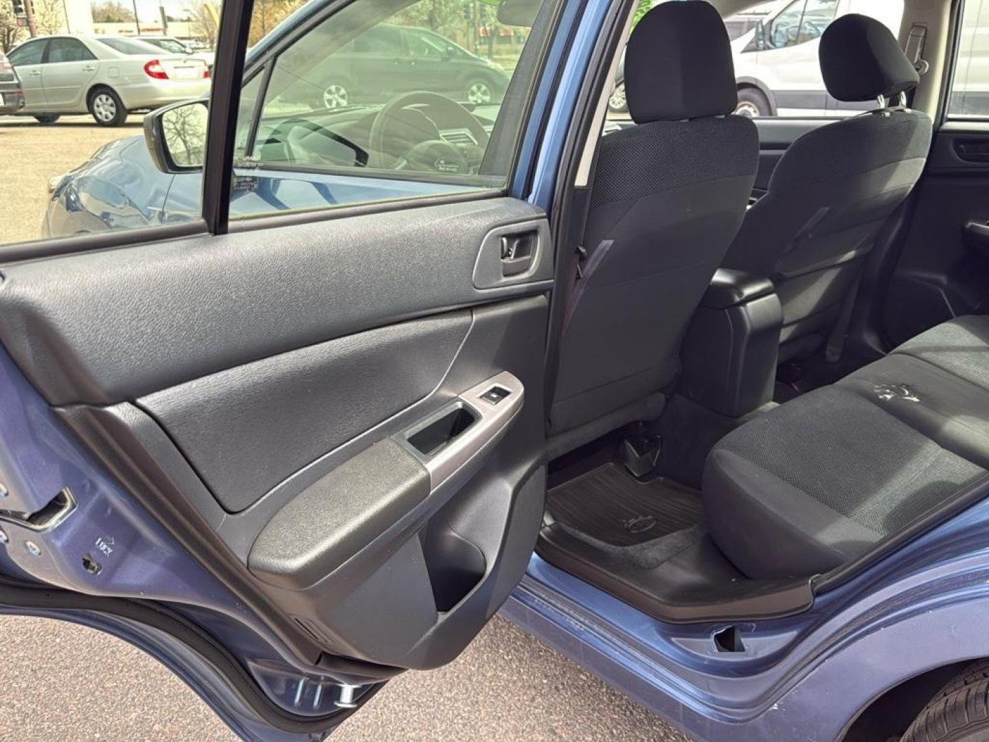 2016 BLUE Subaru Impreza Base (JF1GJAA64GG) with an 4 Cyl, 2.0L engine, Manual transmission, located at 10890 W. Colfax Ave., Lakewood, CO, 80215, (303) 274-7692, 39.739914, -105.120132 - Photo#22