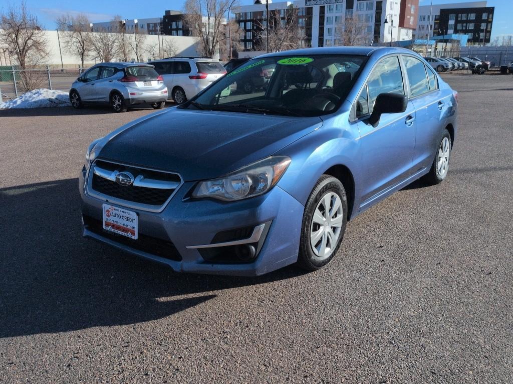 2016 BLUE Subaru Impreza Base (JF1GJAA64GG) with an 4 Cyl, 2.0L engine, Manual transmission, located at 10890 W. Colfax Ave., Lakewood, CO, 80215, (303) 274-7692, 39.739914, -105.120132 - Photo#0