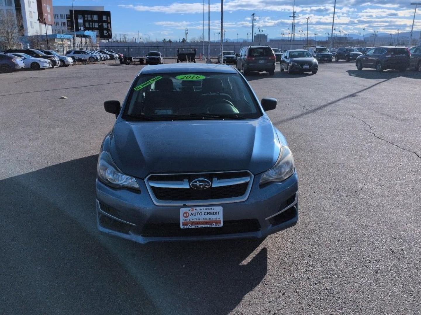 2016 BLUE Subaru Impreza Base (JF1GJAA64GG) with an 4 Cyl, 2.0L engine, Manual 5-Speed transmission, located at 10890 W. Colfax Ave., Lakewood, CO, 80215, (303) 274-7692, 39.739914, -105.120132 - Photo#1
