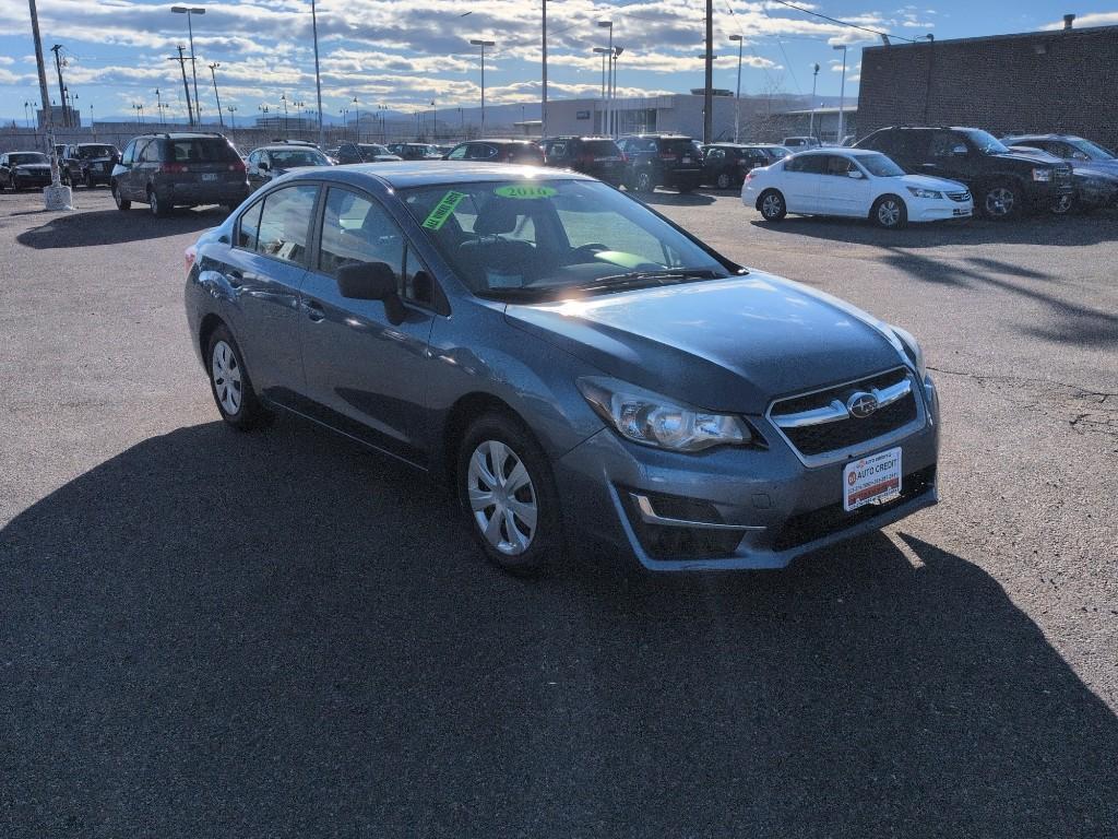 2016 BLUE Subaru Impreza Base (JF1GJAA64GG) with an 4 Cyl, 2.0L engine, Manual transmission, located at 10890 W. Colfax Ave., Lakewood, CO, 80215, (303) 274-7692, 39.739914, -105.120132 - Photo#2