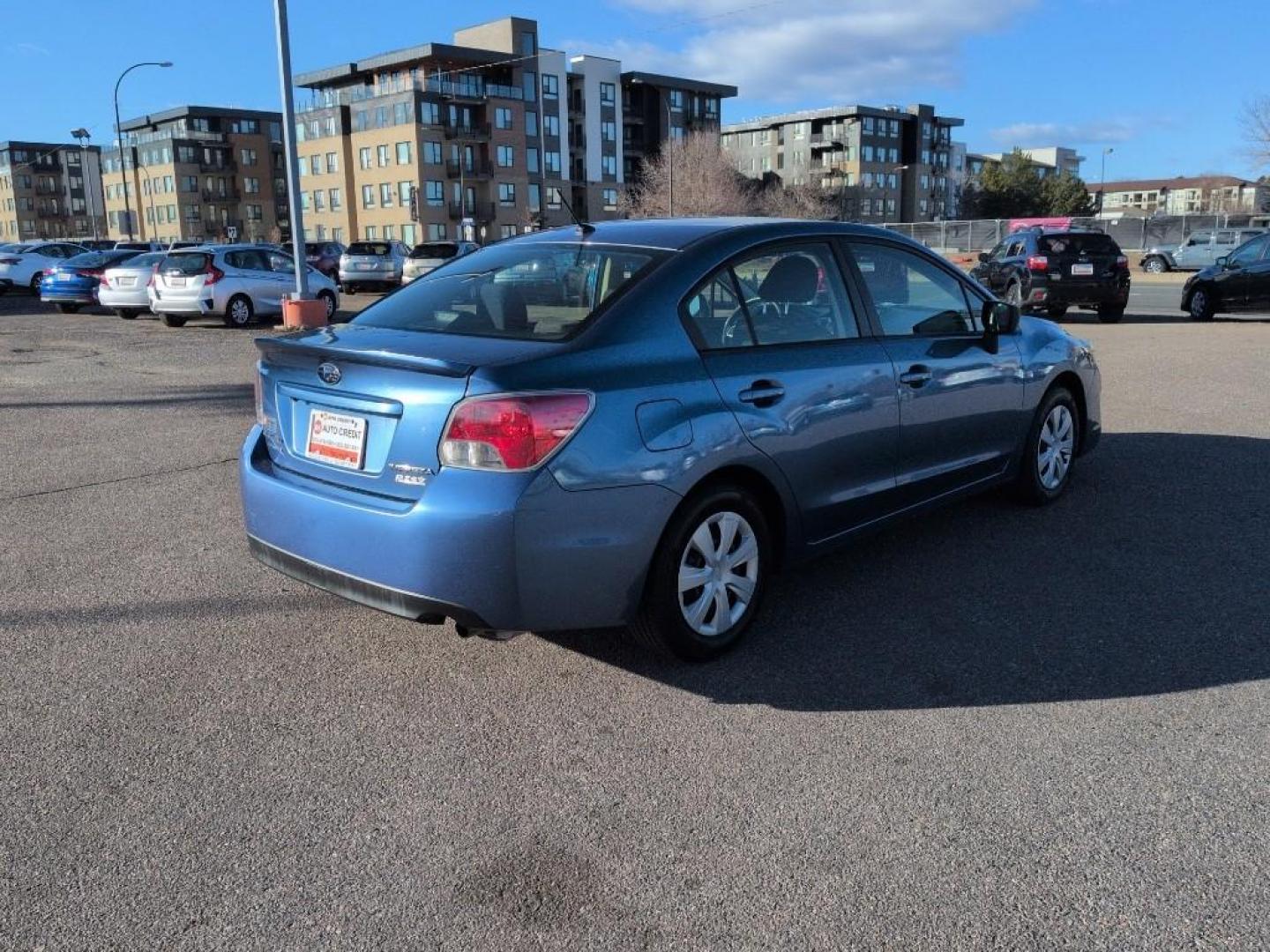 2016 BLUE Subaru Impreza Base (JF1GJAA64GG) with an 4 Cyl, 2.0L engine, Manual 5-Speed transmission, located at 10890 W. Colfax Ave., Lakewood, CO, 80215, (303) 274-7692, 39.739914, -105.120132 - Photo#4