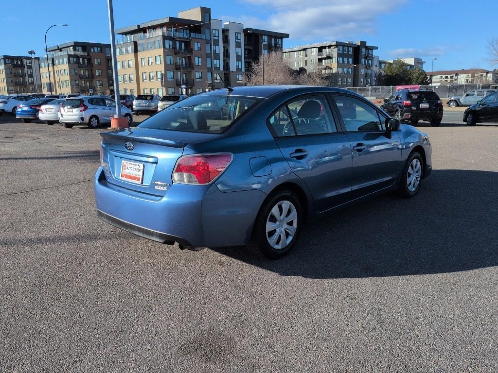 2016 BLUE Subaru Impreza Base (JF1GJAA64GG) with an 4 Cyl, 2.0L engine, Manual transmission, located at 10890 W. Colfax Ave., Lakewood, CO, 80215, (303) 274-7692, 39.739914, -105.120132 - Photo#4