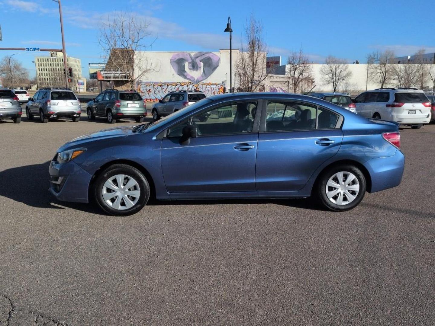 2016 BLUE Subaru Impreza Base (JF1GJAA64GG) with an 4 Cyl, 2.0L engine, Manual 5-Speed transmission, located at 10890 W. Colfax Ave., Lakewood, CO, 80215, (303) 274-7692, 39.739914, -105.120132 - Photo#7