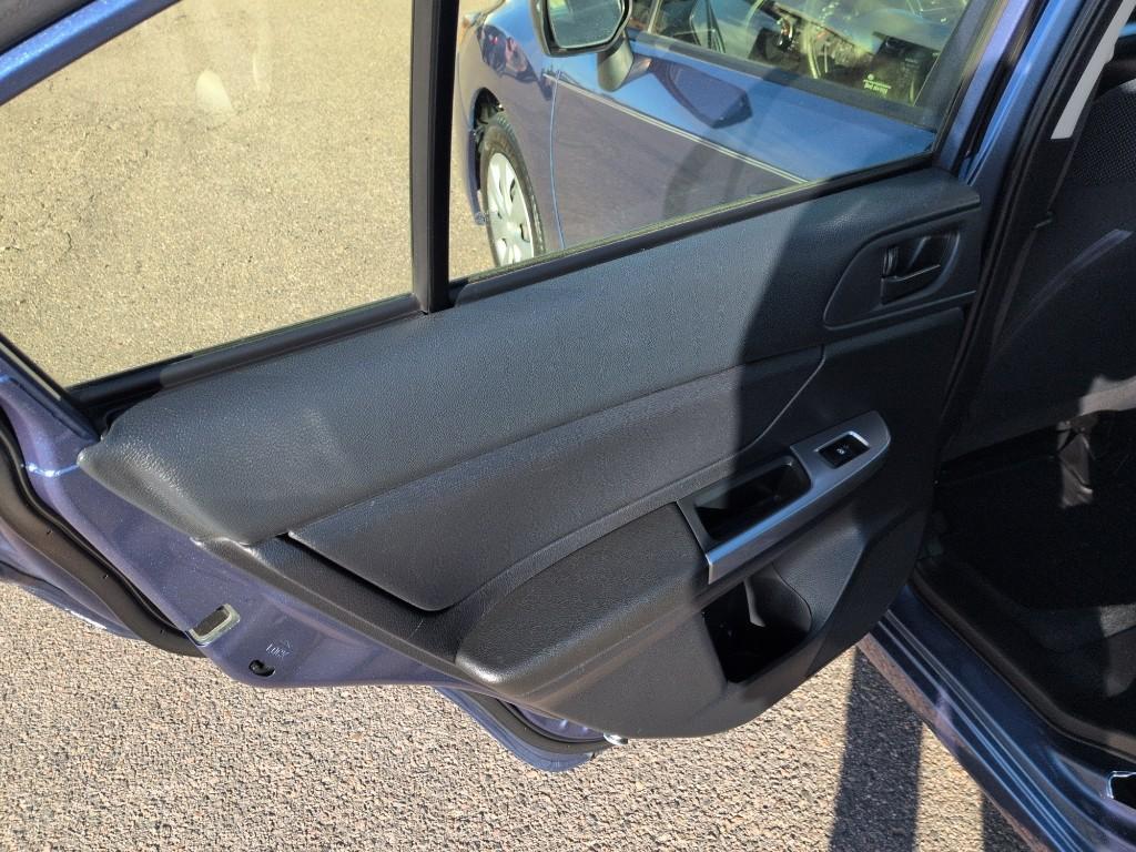 2016 BLUE Subaru Impreza Base (JF1GJAA64GG) with an 4 Cyl, 2.0L engine, Manual transmission, located at 10890 W. Colfax Ave., Lakewood, CO, 80215, (303) 274-7692, 39.739914, -105.120132 - Photo#12