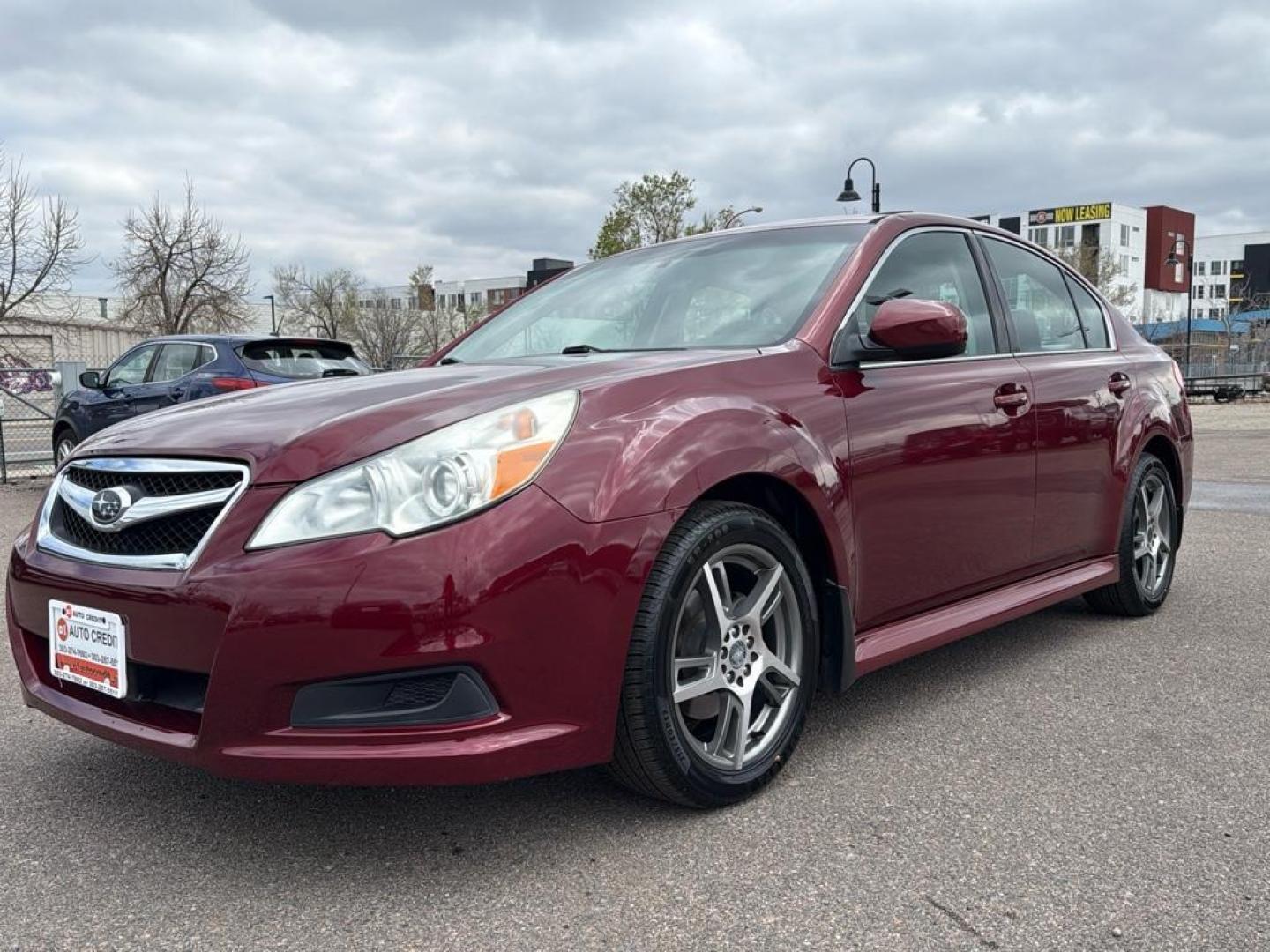 2011 RED Subaru Legacy 2.5i Limited (4S3BMCK66B3) with an 4 Cyl, 2.5L engine, Automatic transmission, located at 10890 W. Colfax Ave., Lakewood, CO, 80215, (303) 274-7692, 39.739914, -105.120132 - Photo#0