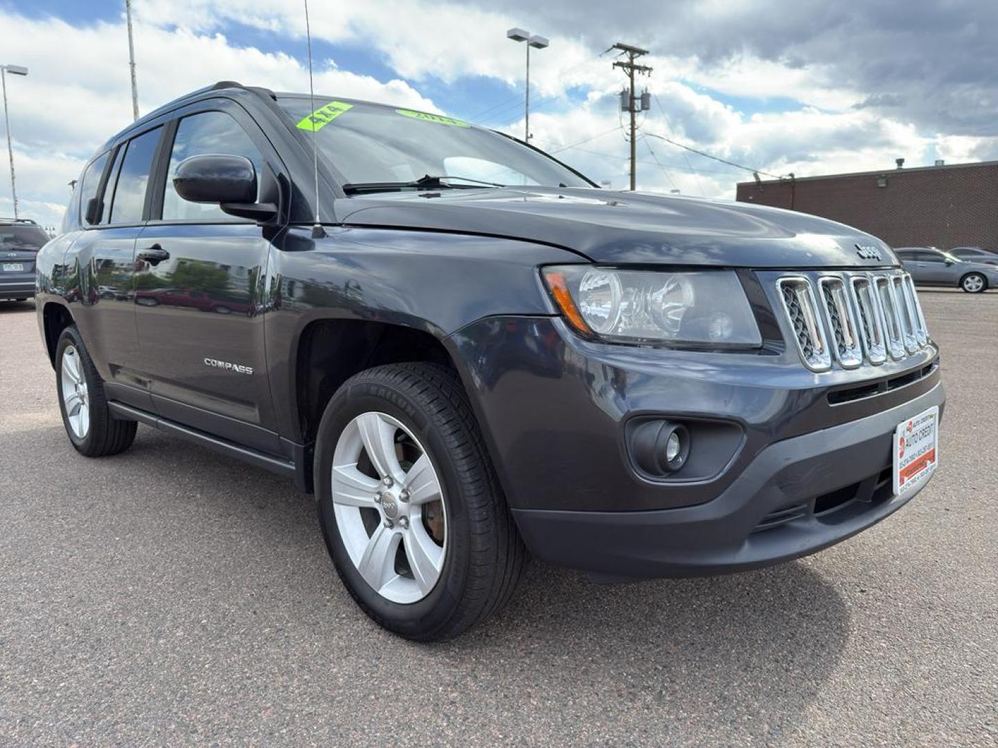 2014 GRAY Jeep Compass Sport (1C4NJDAB0ED) with an 4 Cyl, 2.4L engine, Manual transmission, located at 10890 W. Colfax Ave., Lakewood, CO, 80215, (303) 274-7692, 39.739914, -105.120132 - Discover adventure and reliability with this dynamic 2014 Jeep Compass Sport, the perfect blend of rugged capability and modern comfort! This robust SUV is ready to take you on any journey, with its dependable 4WD system ensuring confidence and control on all terrains, from city streets to off-road - Photo#2