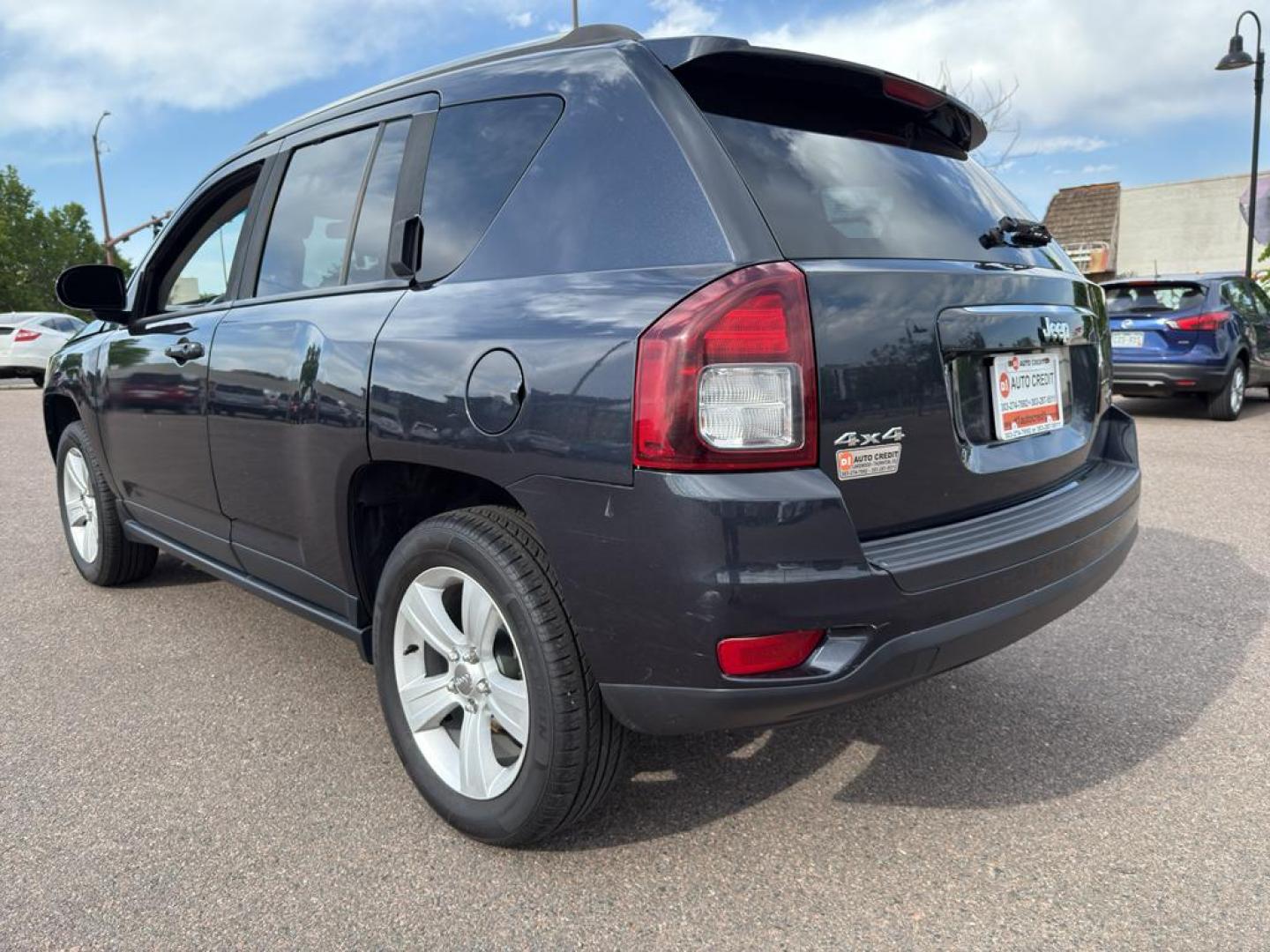 2014 GRAY Jeep Compass Sport (1C4NJDAB0ED) with an 4 Cyl, 2.4L engine, Manual transmission, located at 10890 W. Colfax Ave., Lakewood, CO, 80215, (303) 274-7692, 39.739914, -105.120132 - Discover adventure and reliability with this dynamic 2014 Jeep Compass Sport, the perfect blend of rugged capability and modern comfort! This robust SUV is ready to take you on any journey, with its dependable 4WD system ensuring confidence and control on all terrains, from city streets to off-road - Photo#6
