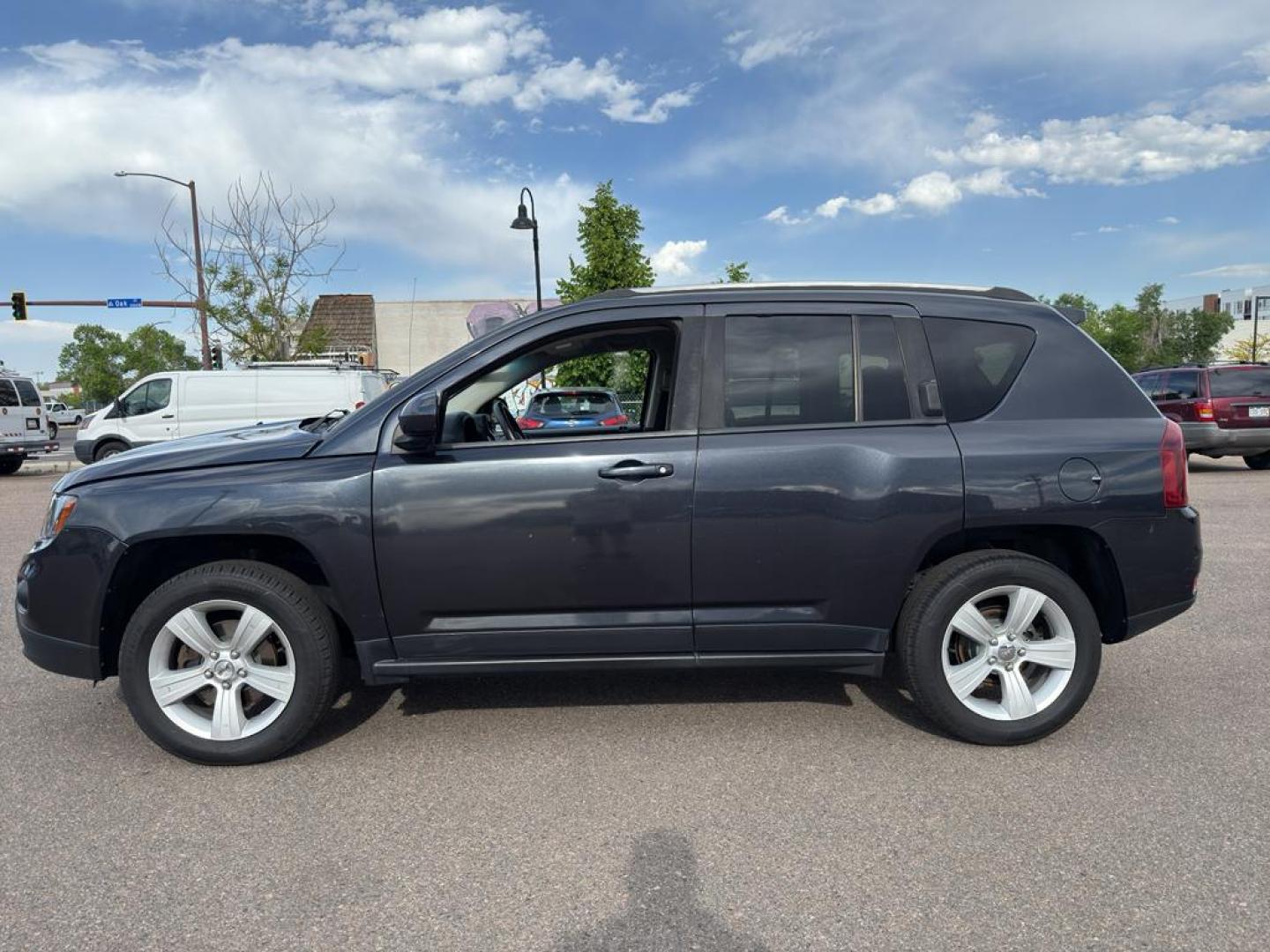 2014 GRAY Jeep Compass Sport (1C4NJDAB0ED) with an 4 Cyl, 2.4L engine, Manual transmission, located at 10890 W. Colfax Ave., Lakewood, CO, 80215, (303) 274-7692, 39.739914, -105.120132 - Discover adventure and reliability with this dynamic 2014 Jeep Compass Sport, the perfect blend of rugged capability and modern comfort! This robust SUV is ready to take you on any journey, with its dependable 4WD system ensuring confidence and control on all terrains, from city streets to off-road - Photo#7