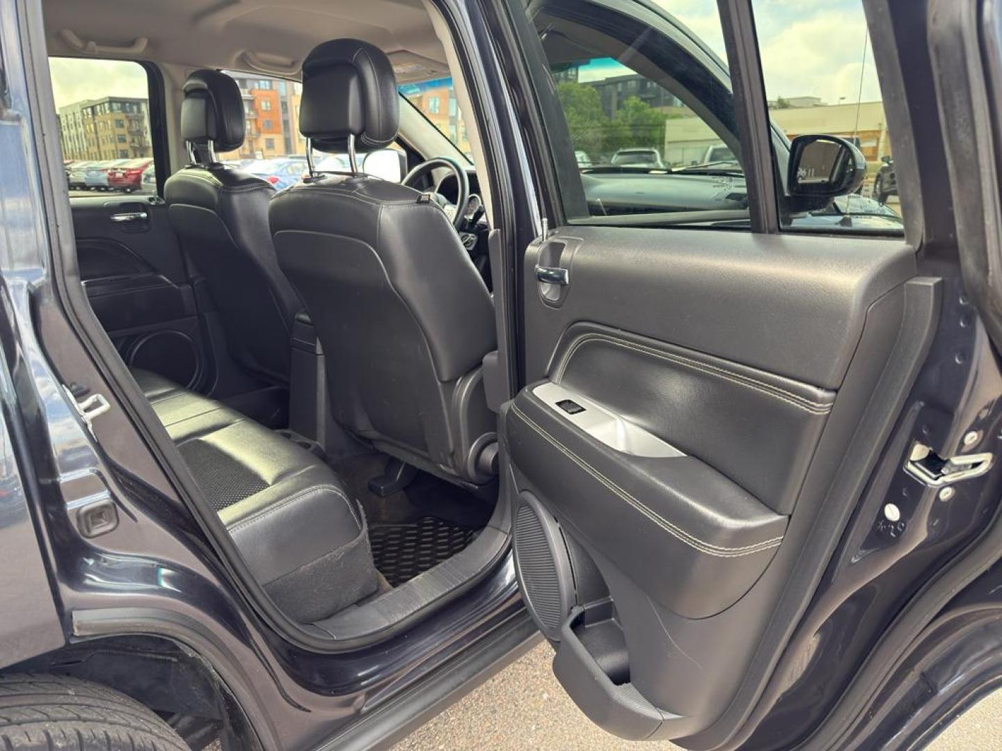 2014 GRAY Jeep Compass Sport (1C4NJDAB0ED) with an 4 Cyl, 2.4L engine, Manual transmission, located at 10890 W. Colfax Ave., Lakewood, CO, 80215, (303) 274-7692, 39.739914, -105.120132 - Discover adventure and reliability with this dynamic 2014 Jeep Compass Sport, the perfect blend of rugged capability and modern comfort! This robust SUV is ready to take you on any journey, with its dependable 4WD system ensuring confidence and control on all terrains, from city streets to off-road - Photo#10