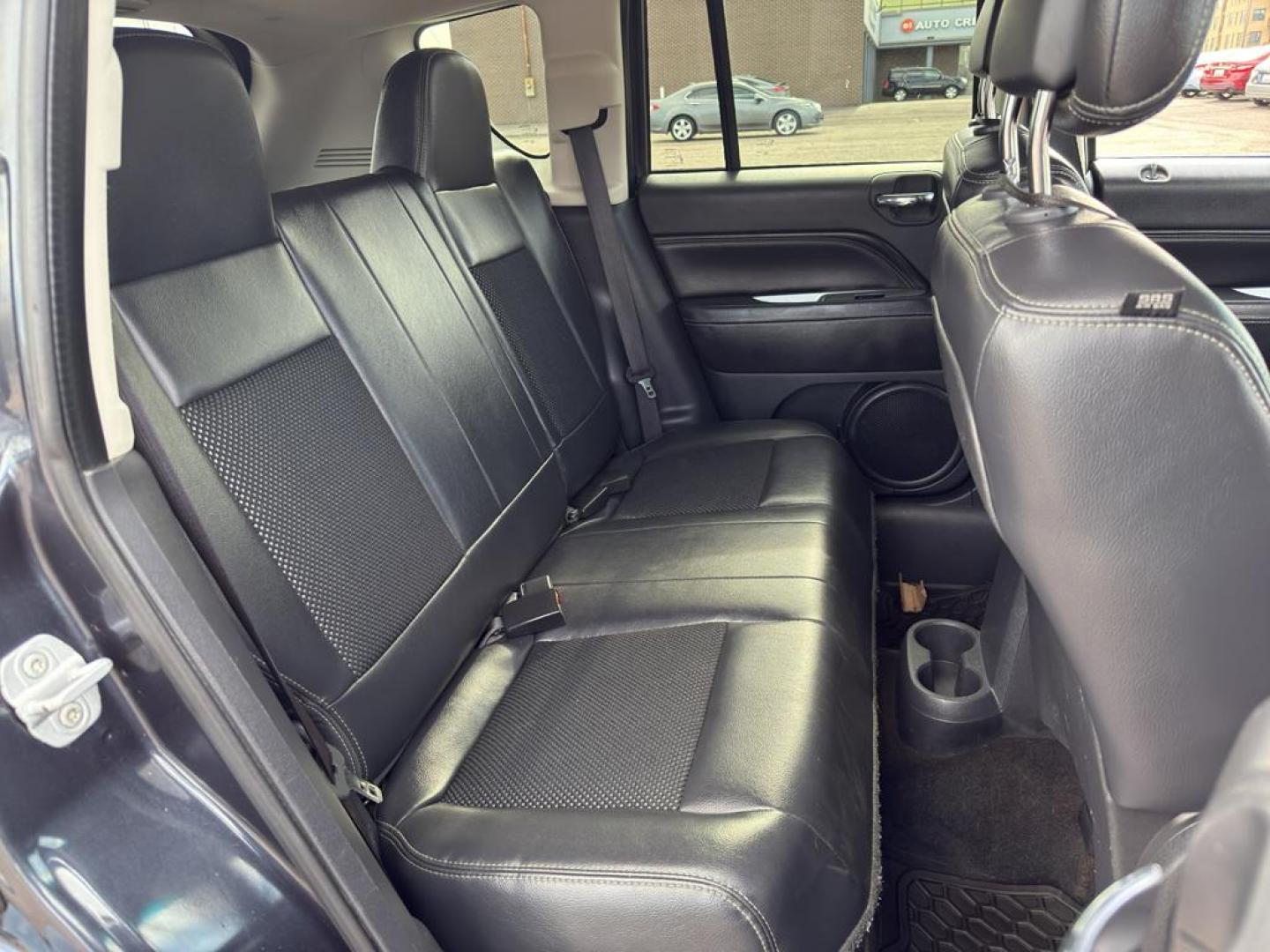 2014 GRAY Jeep Compass Sport (1C4NJDAB0ED) with an 4 Cyl, 2.4L engine, Manual transmission, located at 10890 W. Colfax Ave., Lakewood, CO, 80215, (303) 274-7692, 39.739914, -105.120132 - Discover adventure and reliability with this dynamic 2014 Jeep Compass Sport, the perfect blend of rugged capability and modern comfort! This robust SUV is ready to take you on any journey, with its dependable 4WD system ensuring confidence and control on all terrains, from city streets to off-road - Photo#11