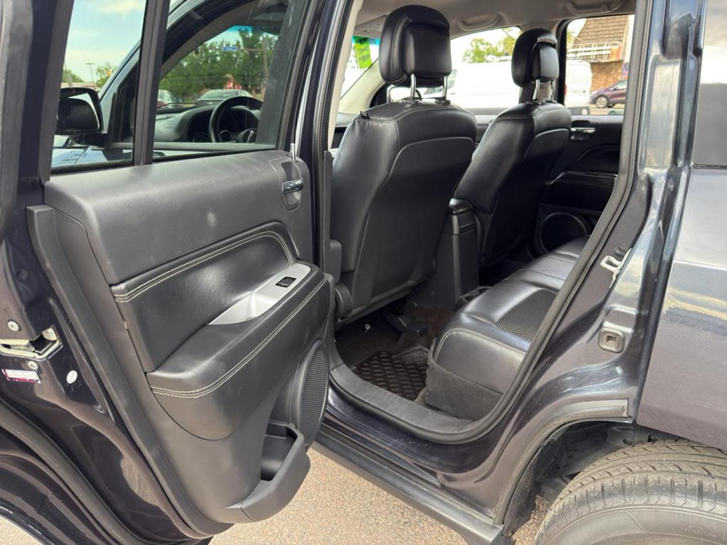 2014 GRAY Jeep Compass Sport (1C4NJDAB0ED) with an 4 Cyl, 2.4L engine, Manual transmission, located at 10890 W. Colfax Ave., Lakewood, CO, 80215, (303) 274-7692, 39.739914, -105.120132 - Discover adventure and reliability with this dynamic 2014 Jeep Compass Sport, the perfect blend of rugged capability and modern comfort! This robust SUV is ready to take you on any journey, with its dependable 4WD system ensuring confidence and control on all terrains, from city streets to off-road - Photo#13