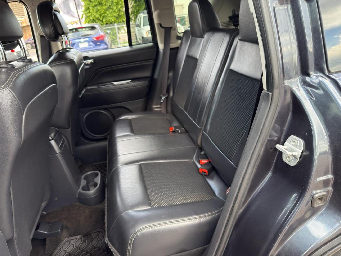2014 GRAY Jeep Compass Sport (1C4NJDAB0ED) with an 4 Cyl, 2.4L engine, Manual transmission, located at 10890 W. Colfax Ave., Lakewood, CO, 80215, (303) 274-7692, 39.739914, -105.120132 - Discover adventure and reliability with this dynamic 2014 Jeep Compass Sport, the perfect blend of rugged capability and modern comfort! This robust SUV is ready to take you on any journey, with its dependable 4WD system ensuring confidence and control on all terrains, from city streets to off-road - Photo#14