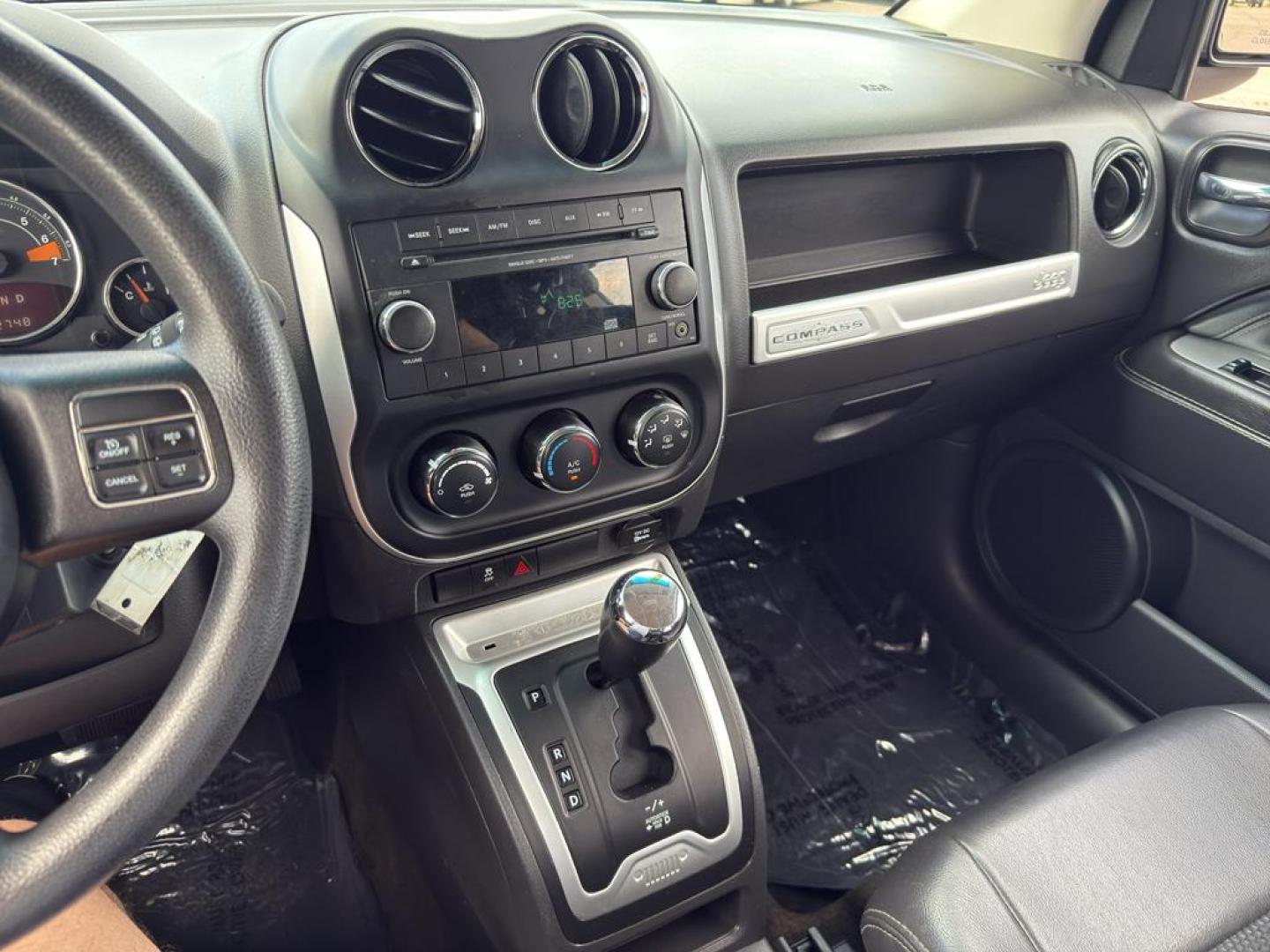 2014 GRAY Jeep Compass Sport (1C4NJDAB0ED) with an 4 Cyl, 2.4L engine, Manual transmission, located at 10890 W. Colfax Ave., Lakewood, CO, 80215, (303) 274-7692, 39.739914, -105.120132 - Discover adventure and reliability with this dynamic 2014 Jeep Compass Sport, the perfect blend of rugged capability and modern comfort! This robust SUV is ready to take you on any journey, with its dependable 4WD system ensuring confidence and control on all terrains, from city streets to off-road - Photo#17